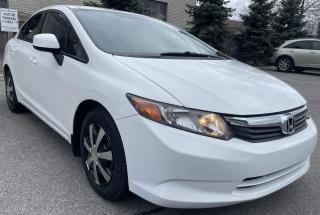 <p>2012 HONDA CIVIC LX WHITE AND GREY WITH BLUETOOTH, CD PLAYER, LOW KMS,4 CYVLINDER,4DOOR, COMES CERTIFIED AND 90 DAYS BUMPER TO BUMPER  SHOP WARRANTY.</p>