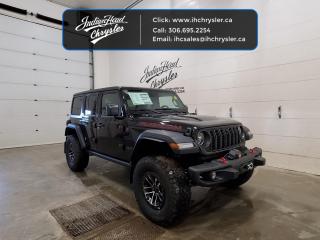 <b>Heavy Duty Suspension,  Climate Control,  Wi-Fi Hotspot,  Tow Equipment,  Fog Lamps!</b><br> <br> <br> <br>  Whether youre concurring a highway mountain pass or challenging off-road trail, this reliable Jeep Wrangler is ready to get you there with style. <br> <br>No matter where your next adventure takes you, this Jeep Wrangler is ready for the challenge. With advanced traction and handling capability, sophisticated safety features and ample ground clearance, the Wrangler is designed to climb up and crawl over the toughest terrain. Inside the cabin of this Wrangler offers supportive seats and comes loaded with the technology you expect while staying loyal to the style and design youve come to know and love.<br> <br> This black SUV  has a 8 speed automatic transmission and is powered by a  285HP 3.6L V6 Cylinder Engine.<br> <br> Our Wranglers trim level is Rubicon. Stepping up to this Wrangler Rubicon rewards you with incredible off-roading capability, thanks to heavy duty suspension, class II towing equipment that includes a hitch and trailer sway control, front active and rear anti-roll bars, upfitter switches, locking front and rear differentials, and skid plates for undercarriage protection. Interior features include an 8-speaker Alpine audio system, voice-activated dual zone climate control, front and rear cupholders, and a 12.3-inch infotainment system with smartphone integration and mobile internet hotspot access. Additional features include cruise control, a leatherette-wrapped steering wheel, proximity keyless entry, and even more. This vehicle has been upgraded with the following features: Heavy Duty Suspension,  Climate Control,  Wi-fi Hotspot,  Tow Equipment,  Fog Lamps,  Cruise Control,  Rear Camera. <br><br> View the original window sticker for this vehicle with this url <b><a href=http://www.chrysler.com/hostd/windowsticker/getWindowStickerPdf.do?vin=1C4RJXFG0RW300018 target=_blank>http://www.chrysler.com/hostd/windowsticker/getWindowStickerPdf.do?vin=1C4RJXFG0RW300018</a></b>.<br> <br>To apply right now for financing use this link : <a href=https://www.indianheadchrysler.com/finance/ target=_blank>https://www.indianheadchrysler.com/finance/</a><br><br> <br/> Weve discounted this vehicle $7278. See dealer for details. <br> <br>At Indian Head Chrysler Dodge Jeep Ram Ltd., we treat our customers like family. That is why we have some of the highest reviews in Saskatchewan for a car dealership!  Every used vehicle we sell comes with a limited lifetime warranty on covered components, as long as you keep up to date on all of your recommended maintenance. We even offer exclusive financing rates right at our dealership so you dont have to deal with the banks.
You can find us at 501 Johnston Ave in Indian Head, Saskatchewan-- visible from the TransCanada Highway and only 35 minutes east of Regina. Distance doesnt have to be an issue, ask us about our delivery options!

Call: 306.695.2254<br> Come by and check out our fleet of 40+ used cars and trucks and 70+ new cars and trucks for sale in Indian Head.  o~o