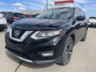 Check out this 2017 Nissan Rogue SL Platinum! This 5 passenger all wheel drive comes equipped with back up camera, Bluetooth, leather, heated, power seats, heated steering wheel, navigation, remote starter, alloy rims, sun roof and so much more!This local trade has passed the stringent 120 point inspection and has a fresh oil change so you can drive with confidence!