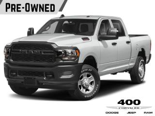 <p>Step into power and reliability with the preowned 2023 Ram 2500 Tradesman Crew Cab 4x4. Built to tackle the toughest jobs with ease, this truck is your ultimate companion on the road and at the worksite. Let's explore what makes this beast stand out:</p>

<p><strong>Exterior:</strong> Dressed in Bright White, the Ram 2500 Tradesman commands attention wherever it goes. With its rugged design, bold lines, and powerful stance, it's ready to take on any challenge that comes its way.</p>

<p><strong>Performance:</strong> Under the hood roars a mighty 6.7L Cummins I-6 turbocharged diesel engine, paired with a robust 6-speed automatic transmission. Whether you're hauling heavy loads or navigating rough terrain, this truck delivers the strength and performance you need to get the job done.</p>

<p><strong>Interior:</strong> Inside, you'll find a spacious and practical interior designed for maximum comfort and functionality. The heavy-duty vinyl front 40/20/40 split bench seat provides ample seating for you and your crew, while features like air conditioning, cruise control, and hands-free phone communication ensure a pleasant driving experience.</p>

<p><strong>Technology:</strong> Stay connected and informed on the go with the 3.5-inch full-color in-cluster display and the 3.5-inch Electronic Vehicle Information Centre. Plus, with the optional Tradesman Level 1 Equipment Group, you'll enjoy added convenience features like power-adjustable mirrors and exterior mirror running lights.</p>

<p><strong>Safety:</strong> Safety is paramount in the Ram 2500 Tradesman, equipped with advanced safety features such as ParkView Rear Back-Up Camera, Advanced multistage front airbags, Electronic Stability Control, and Trailer Sway Control. Whether you're on the highway or off-road, you can drive with confidence knowing that you're protected.</p>

<p>In summary, the preowned 2023 Ram 2500 Tradesman Crew Cab 4x4 is a powerhouse of performance, capability, and reliability. With its rugged exterior, robust engine, practical interior, advanced technology, and top-notch safety features, it's the perfect choice for drivers who demand nothing but the best from their truck. Dominate the road and conquer any challenge with the Ram 2500 Tradesman by your side.</p>