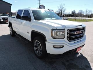 <p>A full loaded and super low mileage 2018 Sierra 1500 SLT with the All Terrain package and only 27000 kms on the odometer. Powered by a 5.3L V8 and 4-wheel drive with optional Auto4 mode. Heated leather seats with both front buckets having power adjust and room for 5 people. Bluetooth and steering wheel mounted audio controls. Sunroof and power rear sliding window. Navigation, front and rear park assist and a back-up camera. Power adjust pedals, remote start and a built-in electric brake controller. 12 service records on the accident free Carfax report including numerous Krown rust proofing records. Dual climate controls, a CD player and full power group. A folding tonneau cover and sprayed in box liner was added to the 5-foot 9-inch length box. A must-see super clean and low mileage crew cab SLT 1500.</p><p>** WE UPDATE OUR WEBSITE REGULARLY IF YOU SEE THIS AD THE VEHICLE IS AVAILABLE! ** Pentastic Motors specializes in 4X4 Gasoline and Diesel trucks from all makes including Dodge, Ford, and General Motors. Extended warranties available!  Financing available from 7.99% APR OAC. Delivery available to Southern Ontario Purchasers! We are 1.5 hrs from Pearson International Airport and offer free pick up from the airport to Purchasers. Leasing options available for Commercial/Agricultural/Personal! **NO ADMIN FEES! All vehicles are CERTIFIED and serviced unless otherwise stated! CARFAX AVAILABLE ON ALL VEHICLES! ** Call, email, or come in for a test drive today! 1-844-4X4-TRUX www.pentasticmotors.com</p><p> </p>