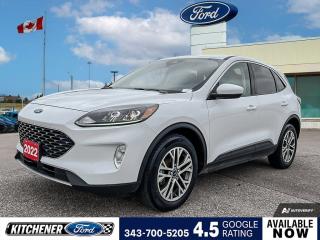 Oxford White 2022 Ford Escape SEL 4D Sport Utility 2.5L iVCT eCVT AWD 2.5L iVCT, eCVT, AWD, 18 Machined-Face Aluminum Wheels, 2.91 Axle Ratio, 4-Wheel Disc Brakes, 6 Speakers, 8-Way Power Driver Seat, ABS brakes, Air Conditioning, Alloy wheels, AM/FM radio: SiriusXM, Auto High-beam Headlights, Automatic temperature control, Block heater, Brake assist, Bumpers: body-colour, Class II Trailer Tow Package, Compass, Delay-off headlights, Driver door bin, Driver vanity mirror, Dual front impact airbags, Dual front side impact airbags, Electronic Fuel Door Release, Electronic Stability Control, Emergency communication system: SYNC 3 911 Assist, Equipment Group 303A, Four wheel independent suspension, Front anti-roll bar, Front Bucket Seats, Front dual zone A/C, Front fog lights, Front reading lights, Fully automatic headlights, Heated ActiveX Trimmed Sport Contour Bucket Seats, Heated door mirrors, Heated front seats, Heated steering wheel, Illuminated entry, Instrument Panel w/6.5 Digital Screen, Knee airbag, Lane Departure Warning System, Low tire pressure warning, Neutral Towing Capability, Occupant sensing airbag, Outside temperature display, Overhead airbag, Overhead console, Panic alarm, Passenger door bin, Passenger vanity mirror, Pedestrian Alert Sounder, Power door mirrors, Power driver seat, Power Liftgate, Power steering, Power windows, Radio data system, Radio: AM/FM Stereo w/SiriusXM, Rear anti-roll bar, Rear reading lights, Rear window defroster, Rear window wiper, Remote keyless entry, Speed control, Speed-sensing steering, Speed-Sensitive Wipers, Split folding rear seat, Spoiler, Steering wheel mounted audio controls, SYNC 3 Communications & Entertainment System, SYNC 3/Apple CarPlay/Android Auto, Telescoping steering wheel, Tilt steering wheel, Traction control, Trip computer, Variably intermittent wipers.