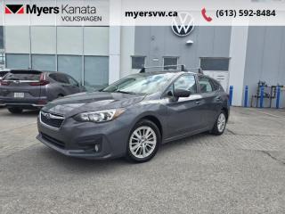 <b>Aluminum Wheels,  Apple CarPlay,  Android Auto,  Touchscreen,  Remote Keyless Entry!</b><br> <br>  Compare at $19569 - Our Price is just $18999! <br> <br>   Get through just about any road condition any time of year with the trusty Subaru Impreza. This  2018 Subaru Impreza is fresh on our lot in Kanata. <br> <br>The 2018 Subaru Impreza stands out in a very competitive class. Thats thanks to its standard all-wheel drive and distinct attitude. It meets or exceeds its competitors at just about everything. Generous tech, a comfortable cabin, and a reliable drivetrain make the Impreza a desirable package. For something a little different in the compact class, check out this Subaru Impreza. This  wagon has 128,125 kms. Its  gray metallic in colour  . It has an automatic transmission and is powered by a  2.0L H4 16V GDI DOHC engine.  <br> <br> Our Imprezas trim level is 5-dr Touring AT. The Touring trim adds some nice features to this Impreza. It includes a backup camera, automatic headlights, aluminum wheels, a leather-wrapped steering wheel, heated front seats, automatic climate control, a 6.5-inch touchscreen infotainment system with Bluetooth, Apple CarPlay, Android Auto, and six-speaker audio, LED taillights, cruise control, and more! This vehicle has been upgraded with the following features: Aluminum Wheels,  Apple Carplay,  Android Auto,  Touchscreen,  Remote Keyless Entry,  Rear View Camera,  Bluetooth. <br> <br>To apply right now for financing use this link : <a href=https://www.myersvw.ca/en/form/new/financing-request-step-1/44 target=_blank>https://www.myersvw.ca/en/form/new/financing-request-step-1/44</a><br><br> <br/><br>Backed by Myers Exclusive NO Charge Engine/Transmission for life program lends itself for your peace of mind and you can buy with confidence. Call one of our experienced Sales Representatives today and book your very own test drive! Why buy from us? Move with the Myers Automotive Group since 1942! We take all trade-ins - Appraisers on site - Full safety inspection including e-testing and professional detailing prior delivery! Every vehicle comes with a free Car Proof History report.<br><br>*LIFETIME ENGINE TRANSMISSION WARRANTY NOT AVAILABLE ON VEHICLES MARKED AS-IS, VEHICLES WITH KMS EXCEEDING 140,000KM, VEHICLES 8 YEARS & OLDER, OR HIGHLINE BRAND VEHICLES (eg.BMW, INFINITI, CADILLAC, LEXUS...). FINANCING OPTIONS NOT AVAILABLE ON VEHICLES MARKED AS-IS OR AS-TRADED.<br> Come by and check out our fleet of 40+ used cars and trucks and 80+ new cars and trucks for sale in Kanata.  o~o