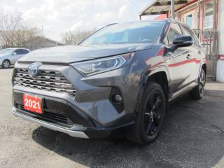 <p>NEW INVENTORY ALERT</p><p>2021 TOYOTA RAV4 ALL-WHEEL DRIVE HYBRID XSE !!</p><p>- HYBRID MODEL IN TWO-TONE BLACK AND GREY</p><p>- BALANCE OF TOYOTA ESP EXTENDED WARRANTY (TO 160,000KMS)</p><p>- TOYOTA DEALER SERVICED AND MAINTAINED </p><p>- NO ACCIDENTS OR CLAIMS </p><p>- ONE OWNER </p><p>- PREMIUM TRIM MODEL WITH ADDITONAL TOYOTA PREMIUM TECHNOLOGY PACKAGE</p><p>- TRAIL, ECO, NORMAL AND SPORT MODES</p><p> </p><p>WONT LAST LONG ! </p><p> </p><p>The pricing listed above does NOT include HST and Licensing </p><p> </p><p>A carfax is also provided to verify prior maintenance, servicing, and/or accident reports and claims history. </p><p> </p><p>WE accept Bad Credit, Good Credit and NO CREDIT! </p><p> </p><p>Our business will expedite all public and private financial lender options to accommodate your financial needs if required to purchase the vehicle of your dreams!</p><p> </p><p>Various vehicle warranties are available upon request and purchase of the vehicle. </p><p> </p><p>We ensure complete customer satisfaction GUARANTEE! Our family owned and operated business has happily been servicing the NIAGARA, HAMILTON, HALTON, TORONTO and GTA region(s) for over 25 YEARS!</p><p> </p><p>If you are interested in/or require further information call us at (905) 572-5559 and book an appointment to view and test drive this vehicle with one of our trusted and OMVIC certified sales persons TODAY! </p><p> </p>