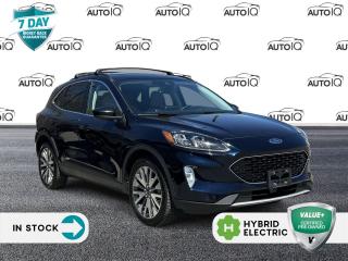 <p><strong>2021 Ford Escape Titanium Hybrid</strong></p>

<p>This 4D Sport Utility comes with:</p>

<ul>
 <li>2.5L iVCT Engine</li>
 <li>eCVT Transmission</li>
 <li>All-Wheel Drive (AWD)</li>
 <li>10 Speakers</li>
 <li>Alloy Wheels</li>
 <li>Black Roof-Rail Crossbars</li>
 <li>Class II Trailer Tow Package</li>
 <li>Navigation System</li>
 <li>SYNC 3 Communications & Entertainment System with Apple CarPlay/Android Auto</li>
</ul>

<p>Features include:</p>

<ul>
 <li>Heated ActiveX Material Sport Contour Bucket Seats</li>
 <li>Heated Steering Wheel</li>
 <li>Rain Sensing Wipers</li>
 <li>Power Liftgate</li>
 <li>Memory Seat</li>
 <li>Security System</li>
</ul>

<p>For safety:</p>

<ul>
 <li>Lane Departure Warning System</li>
 <li>Pedestrian Alert Sounder</li>
 <li>Emergency communication system: SYNC 3 911 Assist</li>
 <li>Traction Control</li>
 <li>Electronic Stability Control</li>
</ul>

<p>And more:</p>

<ul>
 <li>Automatic Temperature Control</li>
 <li>HD Radio</li>
 <li>Split Folding Rear Seat</li>
 <li>Power Windows</li>
</ul>

<p>With Wheels: 19 Machined-Face Aluminum.</p>

<p>SPECIAL NOTE: This vehicle is reserved for AutoIQs Retail Customers Only. Please, No Dealer Calls<br />
<br />
Dont Delay! With over 140 Sales Professionals Promoting this Pre-Owned Vehicle through 11 Dealerships Representing 11 Communities Across Ontario, this Great Value Wont Last Long!<br />
<br />
AutoIQ proudly offers a 7 Day Money Back Guarantee. Buy with Complete Confidence. You wont be disappointed!</p>
<p> </p>

<h4>VALUE+ CERTIFIED PRE-OWNED VEHICLE</h4>

<p>36-point Provincial Safety Inspection<br />
172-point inspection combined mechanical, aesthetic, functional inspection including a vehicle report card<br />
Warranty: 30 Days or 1500 KMS on mechanical safety-related items and extended plans are available<br />
Complimentary CARFAX Vehicle History Report<br />
2X Provincial safety standard for tire tread depth<br />
2X Provincial safety standard for brake pad thickness<br />
7 Day Money Back Guarantee*<br />
Market Value Report provided<br />
Complimentary 3 months SIRIUS XM satellite radio subscription on equipped vehicles<br />
Complimentary wash and vacuum<br />
Vehicle scanned for open recall notifications from manufacturer</p>

<p>SPECIAL NOTE: This vehicle is reserved for AutoIQs retail customers only. Please, No dealer calls. Errors & omissions excepted.</p>

<p>*As-traded, specialty or high-performance vehicles are excluded from the 7-Day Money Back Guarantee Program (including, but not limited to Ford Shelby, Ford mustang GT, Ford Raptor, Chevrolet Corvette, Camaro 2SS, Camaro ZL1, V-Series Cadillac, Dodge/Jeep SRT, Hyundai N Line, all electric models)</p>

<p>INSGMT</p>