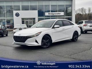Recent Arrival! Ceramic White 2023 Hyundai Elantra Preferred Apple Carplay | Sirus XM | Android Auto FWD IVT I4 Bridgewater Volkswagen, Located in Bridgewater Nova Scotia.4-Wheel Disc Brakes, 6 Speakers, ABS brakes, Air Conditioning, Alloy wheels, AM/FM radio: SiriusXM, Apple CarPlay & Android Auto, Auto High-beam Headlights, Automatic temperature control, Brake assist, Bumpers: body-colour, Compass, Delay-off headlights, Driver door bin, Driver vanity mirror, Dual front impact airbags, Dual front side impact airbags, Electronic Stability Control, Emergency communication system: BlueLink, Exterior Parking Camera Rear, Front anti-roll bar, Front Bucket Seats, Front dual zone A/C, Front reading lights, Front wheel independent suspension, Fully automatic headlights, Heated door mirrors, Heated Front Bucket Seats, Heated front seats, Heated steering wheel, Illuminated entry, Leather Shift Knob, Low tire pressure warning, Navigation System, Occupant sensing airbag, Outside temperature display, Overhead airbag, Panic alarm, Passenger door bin, Passenger vanity mirror, Power door mirrors, Power moonroof, Power steering, Power windows, Premium Cloth Seating Surfaces, Radio: AM/FM/XM/MP3/HD Audio System, Rear window defroster, Remote keyless entry, Security system, Speed control, Speed-sensing steering, Steering wheel mounted audio controls, Tachometer, Telescoping steering wheel, Tilt steering wheel, Traction control, Trip computer, Variably intermittent wipers.Certification Program Details: 150 Points Inspection Fresh Oil Change Free Carfax Full Detail 2 years MVI Full Tank of Gas The 150+ point inspection includes: Engine Instrumentation Interior components Pre-test drive inspections The test drive Service bay inspection Appearance Final inspection