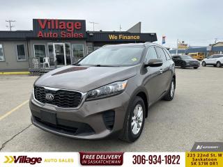 <b>Heated Seats,  Heated Steering Wheel,  Aluminum Wheels,  Remote Keyless Entry,  Rear View Camera!</b><br> <br> We sell high quality used cars, trucks, vans, and SUVs in Saskatoon and surrounding area.<br> <br>   This Kia Sorento is designed to be the ultimate stylish, safe and family friendly SUV with excellent capabilities. This  2019 Kia Sorento is for sale today. <br> <br>This 2019 Kia Sorento is a classy, comfortable, and capable SUV that is built to be the perfect family hauler. It boasts one of the best designed and built interiors within its class, and an elegant exterior design that is sure to capture attention. It delivers a responsive handling feel, while also being very restrained and supple regardless of the road condition. This Kia Sorento does just about everything with grace, confidence and style.This  SUV has 118,597 kms. Its  grey in colour  . It has a 6 speed automatic transmission and is powered by a  185HP 2.4L 4 Cylinder Engine.  <br> <br> Our Sorentos trim level is LX 2.4L AWD. The largest SUV Kia has to offer, this Kia Sorento LX has proven time and time again to be a favorite among families. Features include aluminum wheels, all wheel drive, heated front seats and a heated steering wheel, power heated side mirrors with turn signal indicators, front fog lamps, a voice activated stereo, Bluetooth streaming audio with 7 inch touch screen display, USB fast charging port, SiriusXM satellite radio, cruise control, power door locks with auto-lock feature, rear parking sensors, a rear view camera and much more. This vehicle has been upgraded with the following features: Heated Seats,  Heated Steering Wheel,  Aluminum Wheels,  Remote Keyless Entry,  Rear View Camera,  Bluetooth,  Siriusxm. <br> <br>To apply right now for financing use this link : <a href=https://www.villageauto.ca/car-loan/ target=_blank>https://www.villageauto.ca/car-loan/</a><br><br> <br/><br> Buy this vehicle now for the lowest bi-weekly payment of <b>$168.29</b> with $0 down for 84 months @ 5.99% APR O.A.C. ( Plus applicable taxes -  Plus applicable fees   ).  See dealer for details. <br> <br><br> Village Auto Sales has been a trusted name in the Automotive industry for over 40 years. We have built our reputation on trust and quality service. With long standing relationships with our customers, you can trust us for advice and assistance on all your motoring needs. </br>

<br> With our Credit Repair program, and over 250 well-priced vehicles in stock, youll drive home happy, and thats a promise. We are driven to ensure the best in customer satisfaction and look forward working with you. </br> o~o