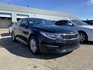 <p>Fully Inspected, ALL Work Complete and Included in Price! Call Us For More Info at 587-409-5859</p>  <p>Step into the sleek and sophisticated world of the 2018 Kia Optima LX, where style meets substance in perfect harmony. With its dynamic design and cutting-edge features, the Optima LX is poised to elevate your driving experience to new heights.</p>  <p>Featuring a bold exterior adorned with striking lines and a signature tiger-nose grille, the Optima LX commands attention wherever it goes. Slip into the spacious and refined interior, where every detail is crafted with precision and comfort in mind. Whether youre navigating city streets or cruising on the open highway, the Optima LX delivers a smooth and responsive ride, thanks to its agile handling and efficient performance.</p>  <p>Equipped with advanced technology like a touchscreen infotainment system and smartphone integration, staying connected on the go has never been easier. Plus, with an array of safety features including available blind-spot detection and lane-keeping assist, you can drive with confidence knowing that the Optima LX has your back.</p>  <p>Experience the perfect blend of style, performance, and innovation with the 2018 Kia Optima LX. Its more than just a carits a statement of modern excellence.</p>  <p>Call 587-409-5859 for more info or to schedule an appointment! Listed Pricing is valid for 72 hours. Financing is available, please see dealer for term availability and interest rates. AMVIC Licensed Business.</p>
