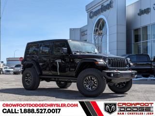 <b>Heavy Duty Suspension,  Climate Control,  Wi-Fi Hotspot,  Tow Equipment,  Fog Lamps!</b><br> <br> <br> <br><b>**Includes Jeep Wave Program - 3 Years Of Free Oil Changes - 3 Years Of Free Tire Rotations - Up To 8 Years Rental & Trip Interruption Coverage</b> <br><br>  This Jeep Wrangler is the culmination of tireless innovation and extensive testing to build the ultimate off-road SUV! <br> <br>No matter where your next adventure takes you, this Jeep Wrangler is ready for the challenge. With advanced traction and handling capability, sophisticated safety features and ample ground clearance, the Wrangler is designed to climb up and crawl over the toughest terrain. Inside the cabin of this Wrangler offers supportive seats and comes loaded with the technology you expect while staying loyal to the style and design youve come to know and love.<br> <br> This black SUV  has a 8 speed automatic transmission and is powered by a  285HP 3.6L V6 Cylinder Engine.<br> <br> Our Wranglers trim level is Rubicon. Stepping up to this Wrangler Rubicon rewards you with incredible off-roading capability, thanks to heavy duty suspension, class II towing equipment that includes a hitch and trailer sway control, front active and rear anti-roll bars, upfitter switches, locking front and rear differentials, and skid plates for undercarriage protection. Interior features include an 8-speaker Alpine audio system, voice-activated dual zone climate control, front and rear cupholders, and a 12.3-inch infotainment system with smartphone integration and mobile internet hotspot access. Additional features include cruise control, a leatherette-wrapped steering wheel, proximity keyless entry, and even more. This vehicle has been upgraded with the following features: Heavy Duty Suspension,  Climate Control,  Wi-fi Hotspot,  Tow Equipment,  Fog Lamps,  Cruise Control,  Rear Camera. <br><br> <br/><br><h3><a href=https://www.crowfootdodgechrysler.com/tools/autoverify/finance.htm>Click here for instant pre-approval!</a></h3><br>

We pride ourselves in consistently exceeding our customers expectations. Please dont hesitate to give us a call.<br> Come by and check out our fleet of 80+ used cars and trucks and 130+ new cars and trucks for sale in Calgary.  o~o