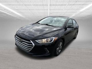The 2018 Hyundai Elantra GL is a popular compact sedan known for its reliability, affordability, and good fuel efficiency. Here are some key features and specifications you can expect from the 2018 Hyundai Elantra GL:Engine and Performance:The Elantra GL typically comes equipped with a 2.0-liter four-cylinder engine.Power output is around 147 horsepower.Available transmissions include a 6-speed manual or 6-speed automatic.Fuel Economy:The 2018 Elantra GL offers good fuel efficiency, with an estimated EPA rating of around 28-32 mpg combined, depending on driving conditions and transmission choice.Interior Features:The GL trim usually includes cloth upholstery.Standard features often consist of a 7-inch touchscreen infotainment system with Android Auto and Apple CarPlay compatibility.Bluetooth connectivity for hands-free calling and audio streaming.USB port(s) for device charging and media playback.Safety Features:Common safety features may include a rearview camera, traction and stability control, antilock brakes, and multiple airbags.Some models might offer additional safety features like blind-spot monitoring and rear cross-traffic alert.Comfort and Convenience:The Elantra GL typically comes with air conditioning, cruise control, and keyless entry.Depending on the specific vehicle, there may be options for heated front seats and a power-adjustable drivers seat.Exterior:The exterior of the 2018 Elantra GL often features 16-inch alloy wheels, LED daytime running lights, and heated side mirrors.Dimensions:The Elantra is a compact sedan with comfortable seating for five passengers.Trunk space is competitive in its class, providing ample room for luggage and groceries.Overall, the 2018 Hyundai Elantra GL is a well-rounded compact sedan that offers good value for its price range, combining practicality, efficiency, and modern features.