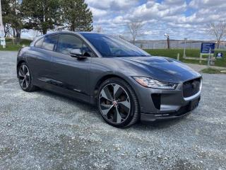 The 2019 Jaguar I-PACE First Edition is a groundbreaking achievement in the realm of electric vehicles, seamlessly blending Jaguars renowned luxury with cutting-edge EV technology. From its striking exterior design to its meticulously crafted interior, every aspect of the I-PACE exudes sophistication and innovation.One of the most impressive features of the I-PACE is its electric powertrain, which delivers exhilarating performance while remaining whisper-quiet. With dual electric motors powering all four wheels, the I-PACE accelerates with effortless grace, reaching 60 mph in just 4.5 seconds. This instantaneous torque delivery provides a driving experience unlike any other, combining seamless acceleration with precise handling for an unparalleled level of responsiveness on the road.Beyond its impressive performance, the I-PACE also offers a spacious and luxurious interior that prioritizes both comfort and functionality. The cabin is meticulously crafted with premium materials, including elegant wood veneers, soft-touch surfaces, and optional Windsor leather upholstery. The attention to detail is evident throughout, from the sleek touch-sensitive controls to the intuitive infotainment system, which seamlessly integrates with the latest smartphone technology.In addition to its luxurious interior, the I-PACE also boasts a range of advanced safety features and driver-assistance technologies, providing peace of mind on every journey. From adaptive cruise control to lane-keeping assist, the I-PACE is equipped with a comprehensive suite of safety systems designed to help prevent accidents and protect occupants in the event of a collision.Furthermore, the I-PACE offers impressive practicality, with ample cargo space and the ability to charge quickly using a public fast-charging station or a home wall box. With a range of up to 234 miles on a single charge, the I-PACE is well-suited for daily commutes, weekend getaways, and everything in between, making it a versatile choice for discerning drivers.Overall, the 2019 Jaguar I-PACE First Edition sets a new standard for electric vehicles, combining breathtaking performance, luxurious comfort, and advanced technology in a package that is as stylish as it is sustainable. Whether youre drawn to its stunning design, its exhilarating driving dynamics, or its eco-friendly credentials, the I-PACE offers a compelling blend of performance and practicality that is sure to impress even the most discerning drivers.