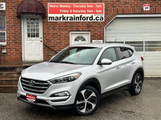 <p>Super-Clean, Local, LOW KM Hyundai Tucson from Bowmanville, ON! This Premium 1.6T AWD model looks stunning with its shimmering Silver paint and factory machine-finished alloy wheels! the exterior features keyless entry with remote trunk release, automatic headlights, foglights, tinted privacy glass, integrated mirror turn signals, blind spot monitor, gorgeous machine-finished factory alloy wheels, sporty dual-tip exhaust, and a peppy fuel efficient 1.6L Turbocharged 4-cylinder engine and automatic transmission driving the All-Wheel-Drive system. The interior is clean and comfortable, with heated cloth seats front and rear, driver power-adjustable seating with lumbar control, a heated leather-wrapped steering wheel with audio and cruise controls, power door locks, windows and mirrors, an easy-to-read and use gauge cluster, central touch screen AM/FM/XM Satellite Radio with Bluetooth, Backup Camera and CD Player, Dual-Zone A/C climate control with front and rear window defrost settings, multiple drive modes, hill descent assist, USB/AUX/12V accessory ports and more!</p><p> </p><p>Carfax Claims Free, Local, LOW KM!</p><p> </p><p>Call (905) 623-2906</p><p> </p><p>Text Ryan: (905) 429-9680 or Email: ryan@markrainford.ca</p><p> </p><p>Text Mark: (905) 431-0966 or Email: mark@markrainford.ca</p>