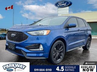 Atlas Blue Metallic 2021 Ford Edge ST Line 250A 250A 4D Sport Utility EcoBoost 2.0L I4 GTDi DOHC Turbocharged VCT 8-Speed Automatic AWD AWD, 3.36 Axle Ratio, Adaptive Cruise Control w/Stop & Go, Air Conditioning, Alloy wheels, Auto High-beam Headlights, Cold Weather Package, Compass, Connected Built-In Touchscreen Navigation System, Delay-off headlights, Driver door bin, Driver vanity mirror, Equipment Group 250A, Evasive Steering Assist, Ford Co-Pilot360 Assist+, Front & Rear Floor Liners w/Carpet Mats, Front Bucket Seats, Front dual zone A/C, Front fog lights, Fully automatic headlights, Heated front seats, Heated Steering Wheel, Lane Centreing, Panoramic Vista Roof, Passenger door bin, Power driver seat, Power steering, Power windows, Rear window defroster, Remote keyless entry, Steering wheel mounted audio controls, Variably intermittent wipers.