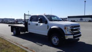 2020 Ford F-550 Flatdeck Crew Cab DRW 4WD 6 Seater Dually, 7.3L V8 OHV 16V Gas engine, 4 door, Automatic, 4WD, AM/FM radio, White Exterior,Deck Mounted Spare Tire, 4WD Selector, Manual Mode, Drive Mode Selector,Aux, Bluetooth, AC 6 Auxiliary Buttons, Fifth Wheel Attachment, Trailer Brake Controller. Deck Dimensions Length 11feet 10 inches Width 7 feet 10 inches Wheel base 203 inches. Certification and decal valid until February 2025. $63,920.00 plus $375 processing fee, $64,295.00 total payment obligation before taxes.  Listing report, warranty, contract commitment cancellation fee, financing available on approved credit (some limitations and exceptions may apply). All above specifications and information is considered to be accurate but is not guaranteed and no opinion or advice is given as to whether this item should be purchased. We do not allow test drives due to theft, fraud and acts of vandalism. Instead we provide the following benefits: Complimentary Warranty (with options to extend), Limited Money Back Satisfaction Guarantee on Fully Completed Contracts, Contract Commitment Cancellation, and an Open-Ended Sell-Back Option. Ask seller for details or call 604-522-REPO(7376) to confirm listing availability.