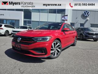 <b>Multi-Function Camera w/Distance Sensor,  Autonomous Emergency Braking,  Adaptive Cruise Control,  Blind Spot Monitor,  Rear Traffic Alert!</b><br> <br>  Compare at $26778 - Our Price is just $25998! <br> <br>   This 2020 Volkswagen Jetta and its crisp detailed exterior lines will remain ageless. This  2020 Volkswagen Jetta is fresh on our lot in Kanata. <br> <br>Redesigned. Not over designed. Rather than adding needless flash, the Jetta has been redesigned for a tasteful, more premium look and feel. One quick glance is all it takes to appreciate the result. Its sporty. Its sleek. It makes a statement without screaming. The overall effect stands out anywhere. Its roomy and well finished interior provides the best of comforts and will help keep this elegant sedan ageless and beautiful for many years to come.This  sedan has 64,495 kms. Its  tornado red in colour  . It has an automatic transmission and is powered by a  228HP 2.0L 4 Cylinder Engine.  It may have some remaining factory warranty, please check with dealer for details. <br> <br> Our Jettas trim level is GLI DSG. This Volkswagen Jetta GLI ups the performance capabilities to deliver a thrilling ride. Features include a powerful 228 horsepower engine, a sport tuned suspension, a mechanical limited slip differential, power sunroof with sunshade, LED brake lights, a Beats premium audio system with a 8 inch touchscreen display and 8 speakers, SiriusXM, App-Connect, satellite navigation, heated and ventilated front sport seats with power driver adjustment, dual zone climate control, wireless charging, a leather sport steering wheel, leather seat trim, a rear view camera and so much more. This vehicle has been upgraded with the following features: Multi-function Camera W/distance Sensor,  Autonomous Emergency Braking,  Adaptive Cruise Control,  Blind Spot Monitor,  Rear Traffic Alert,  Lane Assist . <br> <br>To apply right now for financing use this link : <a href=https://www.myersvw.ca/en/form/new/financing-request-step-1/44 target=_blank>https://www.myersvw.ca/en/form/new/financing-request-step-1/44</a><br><br> <br/><br>Backed by Myers Exclusive NO Charge Engine/Transmission for life program lends itself for your peace of mind and you can buy with confidence. Call one of our experienced Sales Representatives today and book your very own test drive! Why buy from us? Move with the Myers Automotive Group since 1942! We take all trade-ins - Appraisers on site - Full safety inspection including e-testing and professional detailing prior delivery! Every vehicle comes with a free Car Proof History report.<br><br>*LIFETIME ENGINE TRANSMISSION WARRANTY NOT AVAILABLE ON VEHICLES MARKED AS-IS, VEHICLES WITH KMS EXCEEDING 140,000KM, VEHICLES 8 YEARS & OLDER, OR HIGHLINE BRAND VEHICLES (eg.BMW, INFINITI, CADILLAC, LEXUS...). FINANCING OPTIONS NOT AVAILABLE ON VEHICLES MARKED AS-IS OR AS-TRADED.<br> Come by and check out our fleet of 40+ used cars and trucks and 80+ new cars and trucks for sale in Kanata.  o~o