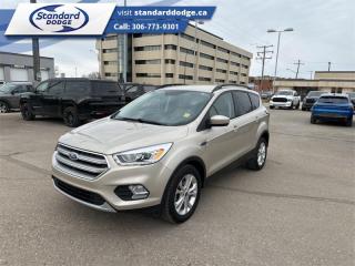 <b>Bluetooth,  Heated Seats,  Rear View Camera,  SiriusXM,  Aluminum Wheels!</b><br> <br>  Compare at $19756 - Our Price is just $17984! <br> <br>   Whether youre getting out of the city for a weekend camping trip or just driving to the grocery store, the 2017 Ford Escape has you covered. This  2017 Ford Escape is for sale today in Swift Current. <br> <br>For 2017, the Escape has under gone a small refresh, updating the exterior with a more angular tailgate, LED tail lights, an aluminum hood and a new fascia that makes it look similar to the other Ford crossovers.  Inside, the Escape now comes with an electric E brake, which frees up the centre console for more cargo and arm space.This  SUV has 100,207 kms. Its  canyon ridge in colour  . It has a 6 speed automatic transmission and is powered by a  179HP 1.5L 4 Cylinder Engine.  <br> <br> Our Escapes trim level is SE. This Escape SE offers a satisfying blend of features and value. It comes with a SYNC infotainment system with Bluetooth connectivity, SiriusXM, a USB port, a rearview camera, heated front seats, steering wheel-mounted audio and cruise control, dual-zone automatic climate control, power windows, power doors, aluminum wheels, fog lamps, and more. This vehicle has been upgraded with the following features: Bluetooth,  Heated Seats,  Rear View Camera,  Siriusxm,  Aluminum Wheels,  Steering Wheel Audio Control, Air. <br> To view the original window sticker for this vehicle view this <a href=http://www.windowsticker.forddirect.com/windowsticker.pdf?vin=1FMCU0GD0HUB63645 target=_blank>http://www.windowsticker.forddirect.com/windowsticker.pdf?vin=1FMCU0GD0HUB63645</a>. <br/><br> <br>To apply right now for financing use this link : <a href=https://standarddodge.ca/financing target=_blank>https://standarddodge.ca/financing</a><br><br> <br/><br>* Stop By Today *Test drive this must-see, must-drive, must-own beauty today at Standard Chrysler Dodge Jeep Ram, 208 Cheadle St W., Swift Current, SK S9H0B5! <br><br> Come by and check out our fleet of 30+ used cars and trucks and 90+ new cars and trucks for sale in Swift Current.  o~o