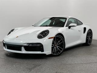 This exquisite 2023 Porsche 911 Turbo S Coupe PDK comes in White. The interior is Classic Black with the Extended Heritage Design Package. Highly optioned vehicle with Front Axle System, Sport Exhaust System, Burmester High End Surround Sound System, PASM Sport Suspension (Lowered 10mm), Front Protection Film and numerous other premium features. It boasts a clean history with no reported accidents or claims, having been meticulously maintained by its dedicated owner. Porsche Center Langley has won the prestigious Porsche Premier Dealer Award for 7 years in a row. We are centrally located just a short distance from Highway 1 in beautiful Langley, British Columbia Canada.  We have many attractive Finance/Lease options available and can tailor a plan that suits your needs. Please contact us now to speak with one of our highly trained Sales Executives before it is gone.