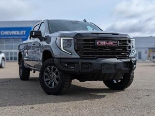 <br> <br> <br> <br> <br>This 2024 GMC Sierra 1500 stands out in the midsize pickup truck segment, with bold proportions that create a commanding stance on and off road. Next level comfort and technology is paired with its outstanding performance and capability. Inside, the Sierra 1500 supports you through rough terrain with expertly designed seats and robust suspension. This amazing 2024 Sierra 1500 is ready for whatever.<br> <br> This thunderstorm grey metallic Crew Cab 4X4 pickup has an automatic transmission and is powered by a 420HP 6.2L 8 Cylinder Engine.<br> <br> Our Sierra 1500s trim level is AT4X. Taking your off road adventures to the max, this highly capable GMC Sierra 1500 AT4X comes fully loaded with an upgraded off-road suspension that features Multimatic DSSV spool-valve dampers and underbody skid plates, full grain leather seats with authentic Vanta Ash wood trim, exclusive aluminum wheels, body-coloured exterior accents and a massive 13.4 inch touchscreen display that features wireless Apple CarPlay and Android Auto, 12 speaker Bose premium audio system, SiriusXM, and a 4G LTE hotspot. Additionally, this amazing pickup truck also features a power sunroof, spray-in bedliner, wireless device charging, IntelliBeam LED headlights, remote engine start, forward collision warning and lane keep assist, a trailer-tow package with hitch guidance, LED cargo area lighting, heads up display, heated and cooled seats with massage function, ultrasonic parking sensors, an HD surround vision camera plus so much more! This vehicle has been upgraded with the following features: Off-road Package, Hud, Sunroof, Multi-pro Tailgate, Wireless Charging, Adaptive Cruise Control. <br><br> <br/><br>Contact our Sales Department today by: <br><br>Phone: 1 (306) 882-2691 <br><br>Text: 1-306-800-5376 <br><br>- Want to trade your vehicle? Make the drive and well have it professionally appraised, for FREE! <br><br>- Financing available! Onsite credit specialists on hand to serve you! <br><br>- Apply online for financing! <br><br>- Professional, courteous, and friendly staff are ready to help you get into your dream ride! <br><br>- Call today to book your test drive! <br><br>- HUGE selection of new GMC, Buick and Chevy Vehicles! <br><br>- Fully equipped service shop with GM certified technicians <br><br>- Full Service Quick Lube Bay! Drive up. Drive in. Drive out! <br><br>- Best Oil Change in Saskatchewan! <br><br>- Oil changes for all makes and models including GMC, Buick, Chevrolet, Ford, Dodge, Ram, Kia, Toyota, Hyundai, Honda, Chrysler, Jeep, Audi, BMW, and more! <br><br>- Rosetowns ONLY Quick Lube Oil Change! <br><br>- 24/7 Touchless car wash <br><br>- Fully stocked parts department featuring a large line of in-stock winter tires! <br> <br><br><br>Rosetown Mainline Motor Products, also known as Mainline Motors is the ORIGINAL King Of Trucks, featuring Chevy Silverado, GMC Sierra, Buick Enclave, Chevy Traverse, Chevy Equinox, Chevy Cruze, GMC Acadia, GMC Terrain, and pre-owned Chevy, GMC, Buick, Ford, Dodge, Ram, and more, proudly serving Saskatchewan. As part of the Mainline Automotive Group of Dealerships in Western Canada, we are also committed to servicing customers anywhere in Western Canada! We have a huge selection of cars, trucks, and crossover SUVs, so if youre looking for your next new GMC, Buick, Chevrolet or any brand on a used vehicle, dont hesitate to contact us online, give us a call at 1 (306) 882-2691 or swing by our dealership at 506 Hyw 7 W in Rosetown, Saskatchewan. We look forward to getting you rolling in your next new or used vehicle! <br> <br><br><br>* Vehicles may not be exactly as shown. Contact dealer for specific model photos. Pricing and availability subject to change. All pricing is cash price including fees. Taxes to be paid by the purchaser. While great effort is made to ensure the accuracy of the information on this site, errors do occur so please verify information with a customer service rep. This is easily done by calling us at 1 (306) 882-2691 or by visiting us at the dealership. <br><br> Come by and check out our fleet of 50+ used cars and trucks and 140+ new cars and trucks for sale in Rosetown. o~o
