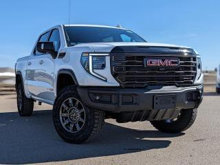 <br> <br> With a bold profile and distinctive stance, this 2024 Sierra turns heads and makes a statement on the jobsite, out in town or wherever life leads you. <br> <br>This 2024 GMC Sierra 1500 stands out in the midsize pickup truck segment, with bold proportions that create a commanding stance on and off road. Next level comfort and technology is paired with its outstanding performance and capability. Inside, the Sierra 1500 supports you through rough terrain with expertly designed seats and robust suspension. This amazing 2024 Sierra 1500 is ready for whatever.<br> <br> This summit white Crew Cab 4X4 pickup has an automatic transmission and is powered by a 420HP 6.2L 8 Cylinder Engine.<br> <br> Our Sierra 1500s trim level is AT4X. Taking your off road adventures to the max, this highly capable GMC Sierra 1500 AT4X comes fully loaded with an upgraded off-road suspension that features Multimatic DSSV spool-valve dampers and underbody skid plates, full grain leather seats with authentic Vanta Ash wood trim, exclusive aluminum wheels, body-coloured exterior accents and a massive 13.4 inch touchscreen display that features wireless Apple CarPlay and Android Auto, 12 speaker Bose premium audio system, SiriusXM, and a 4G LTE hotspot. Additionally, this amazing pickup truck also features a power sunroof, spray-in bedliner, wireless device charging, IntelliBeam LED headlights, remote engine start, forward collision warning and lane keep assist, a trailer-tow package with hitch guidance, LED cargo area lighting, heads up display, heated and cooled seats with massage function, ultrasonic parking sensors, an HD surround vision camera plus so much more! This vehicle has been upgraded with the following features: Off-road Package, Hud, Sunroof, Multi-pro Tailgate, Wireless Charging, Adaptive Cruise Control. <br><br> <br/><br>Contact our Sales Department today by: <br><br>Phone: 1 (306) 882-2691 <br><br>Text: 1-306-800-5376 <br><br>- Want to trade your vehicle? Make the drive and well have it professionally appraised, for FREE! <br><br>- Financing available! Onsite credit specialists on hand to serve you! <br><br>- Apply online for financing! <br><br>- Professional, courteous, and friendly staff are ready to help you get into your dream ride! <br><br>- Call today to book your test drive! <br><br>- HUGE selection of new GMC, Buick and Chevy Vehicles! <br><br>- Fully equipped service shop with GM certified technicians <br><br>- Full Service Quick Lube Bay! Drive up. Drive in. Drive out! <br><br>- Best Oil Change in Saskatchewan! <br><br>- Oil changes for all makes and models including GMC, Buick, Chevrolet, Ford, Dodge, Ram, Kia, Toyota, Hyundai, Honda, Chrysler, Jeep, Audi, BMW, and more! <br><br>- Rosetowns ONLY Quick Lube Oil Change! <br><br>- 24/7 Touchless car wash <br><br>- Fully stocked parts department featuring a large line of in-stock winter tires! <br> <br><br><br>Rosetown Mainline Motor Products, also known as Mainline Motors is the ORIGINAL King Of Trucks, featuring Chevy Silverado, GMC Sierra, Buick Enclave, Chevy Traverse, Chevy Equinox, Chevy Cruze, GMC Acadia, GMC Terrain, and pre-owned Chevy, GMC, Buick, Ford, Dodge, Ram, and more, proudly serving Saskatchewan. As part of the Mainline Automotive Group of Dealerships in Western Canada, we are also committed to servicing customers anywhere in Western Canada! We have a huge selection of cars, trucks, and crossover SUVs, so if youre looking for your next new GMC, Buick, Chevrolet or any brand on a used vehicle, dont hesitate to contact us online, give us a call at 1 (306) 882-2691 or swing by our dealership at 506 Hyw 7 W in Rosetown, Saskatchewan. We look forward to getting you rolling in your next new or used vehicle! <br> <br><br><br>* Vehicles may not be exactly as shown. Contact dealer for specific model photos. Pricing and availability subject to change. All pricing is cash price including fees. Taxes to be paid by the purchaser. While great effort is made to ensure the accuracy of the information on this site, errors do occur so please verify information with a customer service rep. This is easily done by calling us at 1 (306) 882-2691 or by visiting us at the dealership. <br><br> Come by and check out our fleet of 50+ used cars and trucks and 140+ new cars and trucks for sale in Rosetown. o~o