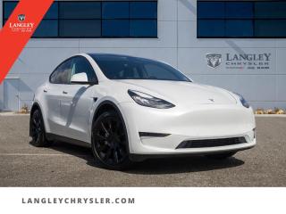 <p><strong><span style=font-family:Arial; font-size:18px;>Exult in the sophistication and power that this remarkably engineered 2021 Tesla Model Y Long Range provides..</span></strong></p> <p><strong><span style=font-family:Arial; font-size:18px;>An epitome of pure electric efficiency, this stunning white SUV, with its sleek black leather interior, is much more than just a vehicle..</span></strong> <br> It is a testament to cutting-edge technology and luxurious comfort combined into a seamless driving experience.. With a mere 60,794 km on the odometer, this gently used marvel still retains the freshness of a brand new car.</p> <p><strong><span style=font-family:Arial; font-size:18px;>Its accident-free history further solidifies its pristine condition, making it a rare find in the pre-owned vehicle market..</span></strong> <br> The Model Y Long Range is powered by an efficient electric engine, paired with a seamless 1-speed automatic transmission.. It boasts an array of advanced features such as traction control, a navigation system, adaptive cruise control, and ABS brakes, ensuring a safe and smooth journey.</p> <p><strong><span style=font-family:Arial; font-size:18px;>Inside, youll find a plethora of luxury amenities..</span></strong> <br> From power windows and steering to a 1-touch down, auto tilt-away steering wheel, this SUV ensures a comfortable ride for all.. The auto-dimming door mirrors, rearview mirror, and automatic temperature control provide added convenience, while the genuine wood dashboard insert adds a touch of elegance.</p> <p><strong><span style=font-family:Arial; font-size:18px;>The Model Y Long Range is equipped with state-of-the-art safety features, including dual front impact airbags, electronic stability, and a low tire pressure warning system, ensuring peace of mind on every journey..</span></strong> <br> With its advanced FM radio and smart device integration, your entertainment is guaranteed.. The exterior parking camera system ensures effortless parking, while the regenerative braking system offers efficient energy usage.</p> <p><strong><span style=font-family:Arial; font-size:18px;>Now, at Langley Chrysler, dont just love your car, love buying it..</span></strong> <br> Our team is dedicated to making your car buying experience as enjoyable as the vehicle itself.. In shimmering white, it glides,
Power and grace combined,
Tesla Model Y rides.</p> <p><strong><span style=font-family:Arial; font-size:18px;>Experience this remarkable SUV at Langley Chrysler today..</span></strong> <br> Stand out from the crowd with the 2021 Tesla Model Y Long Range - a vehicle that truly encapsulates the future of driving</p>Documentation Fee $968, Finance Placement $628, Safety & Convenience Warranty $699

<p>*All prices plus applicable taxes, applicable environmental recovery charges, documentation of $599 and full tank of fuel surcharge of $76 if a full tank is chosen. <br />Other protection items available that are not included in the above price:<br />Tire & Rim Protection and Key fob insurance starting from $599<br />Service contracts (extended warranties) for coverage up to 7 years and 200,000 kms starting from $599<br />Custom vehicle accessory packages, mudflaps and deflectors, tire and rim packages, lift kits, exhaust kits and tonneau covers, canopies and much more that can be added to your payment at time of purchase<br />Undercoating, rust modules, and full protection packages starting from $199<br />Financing Fee of $500 when applicable<br />Flexible life, disability and critical illness insurances to protect portions of or the entire length of vehicle loan</p>