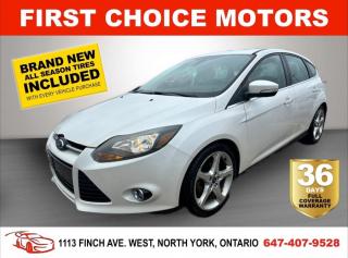 Welcome to First Choice Motors, the largest car dealership in Toronto of pre-owned cars, SUVs, and vans priced between $5000-$15,000. With an impressive inventory of over 300 vehicles in stock, we are dedicated to providing our customers with a vast selection of affordable and reliable options. <br><br>Were thrilled to offer a used 2012 Ford Focus TITANIUM, white color with 209,000km (STK#7197) This vehicle was $6990 NOW ON SALE FOR $5990. It is equipped with the following features:<br>- Manual Transmission<br>- Hatchback<br>- Leather Seats<br>- Sunroof<br>- Heated seats<br>- Bluetooth<br>- Alloy wheels<br>- Power windows<br>- Power locks<br>- Power mirrors<br>- Air Conditioning<br><br>At First Choice Motors, we believe in providing quality vehicles that our customers can depend on. All our vehicles come with a 36-day FULL COVERAGE warranty. We also offer additional warranty options up to 5 years for our customers who want extra peace of mind.<br><br>Furthermore, all our vehicles are sold fully certified with brand new brakes rotors and pads, a fresh oil change, and brand new set of all-season tires installed & balanced. You can be confident that this car is in excellent condition and ready to hit the road.<br><br>At First Choice Motors, we believe that everyone deserves a chance to own a reliable and affordable vehicle. Thats why we offer financing options with low interest rates starting at 7.9% O.A.C. Were proud to approve all customers, including those with bad credit, no credit, students, and even 9 socials. Our finance team is dedicated to finding the best financing option for you and making the car buying process as smooth and stress-free as possible.<br><br>Our dealership is open 7 days a week to provide you with the best customer service possible. We carry the largest selection of used vehicles for sale under $9990 in all of Ontario. We stock over 300 cars, mostly Hyundai, Chevrolet, Mazda, Honda, Volkswagen, Toyota, Ford, Dodge, Kia, Mitsubishi, Acura, Lexus, and more. With our ongoing sale, you can find your dream car at a price you can afford. Come visit us today and experience why we are the best choice for your next used car purchase!<br><br>All prices exclude a $10 OMVIC fee, license plates & registration  and ONTARIO HST (13%)