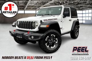 2024 Jeep Wrangler Rubicon 2 Door | 3.6L V6 | Heated Seats | Uconnect 5 12.3" Touchscreen Display w/ Navigation | Apple CarPlay & Android Auto | Heated Steering Wheel | Remote Start | Alpine Premium Audio System | Integrated Off-road Camera | LED Lighting | Black Freedom Top 3-piece Hardtop

One Owner Clean Carfax

Introducing the all-new 2024 Jeep Wrangler Rubicon 2 Door, where rugged capability meets cutting-edge technology. Equipped with a powerful 3.6L V6 engine, this iconic SUV is ready to tackle any adventure with confidence. Step inside, and youll be greeted by the spacious and comfortable cabin, featuring heated seats and a heated steering wheel to keep you warm on chilly days. But the real standout feature is the new Uconnect 5 12.3" touchscreen display, which puts all your favorite apps, navigation, and entertainment at your fingertips. Seamlessly integrate your smartphone with Apple CarPlay and Android Auto, and enjoy crystal-clear sound quality with the Alpine Premium Audio System. With the integrated off-road camera and LED lighting, youll have enhanced visibility on and off the road, while the black Freedom Top 3-piece hardtop adds a touch of style to the rugged exterior. Whether youre navigating city streets or exploring the great outdoors, the 2024 Jeep Wrangler Rubicon is the ultimate companion for all your adventures.
______________________________________________________

Engage & Explore with Peel Chrysler: Whether youre inquiring about our latest offers or seeking guidance, 1-866-652-6197 connects you directly. Dive deeper online or connect with our team to navigate your automotive journey seamlessly.

WE TAKE ALL TRADES & CREDIT. WE SHIP ANYWHERE IN CANADA! OUR TEAM IS READY TO SERVE YOU 7 DAYS! COME SEE WHY NOBODY BEATS A DEAL FROM PEEL! Your Source for ALL make and models used cars and trucks
______________________________________________________

*FREE CarFax (click the link above to check it out at no cost to you!)*

*FULLY CERTIFIED! (Have you seen some of these other dealers stating in their advertisements that certification is an additional fee? NOT HERE! Our certification is already included in our low sale prices to save you more!)

______________________________________________________

Peel Chrysler — A Trusted Destination: Based in Port Credit, Ontario, we proudly serve customers from all corners of Ontario and Canada including Toronto, Oakville, North York, Richmond Hill, Ajax, Hamilton, Niagara Falls, Brampton, Thornhill, Scarborough, Vaughan, London, Windsor, Cambridge, Kitchener, Waterloo, Brantford, Sarnia, Pickering, Huntsville, Milton, Woodbridge, Maple, Aurora, Newmarket, Orangeville, Georgetown, Stouffville, Markham, North Bay, Sudbury, Barrie, Sault Ste. Marie, Parry Sound, Bracebridge, Gravenhurst, Oshawa, Ajax, Kingston, Innisfil and surrounding areas. On our website www.peelchrysler.com, you will find a vast selection of new vehicles including the new and used Ram 1500, 2500 and 3500. Chrysler Grand Caravan, Chrysler Pacifica, Jeep Cherokee, Wrangler and more. All vehicles are priced to sell. We deliver throughout Canada. website or call us 1-866-652-6197. 

Your Journey, Our Commitment: Beyond the transaction, Peel Chrysler prioritizes your satisfaction. While many of our pre-owned vehicles come equipped with two keys, variations might occur based on trade-ins. Regardless, our commitment to quality and service remains steadfast. Experience unmatched convenience with our nationwide delivery options. All advertised prices are for cash sale only. Optional Finance and Lease terms are available. A Loan Processing Fee of $499 may apply to facilitate selected Finance or Lease options. If opting to trade an encumbered vehicle towards a purchase and require Peel Chrysler to facilitate a lien payout on your behalf, a Lien Payout Fee of $299 may apply. Contact us for details. Peel Chrysler Pre-Owned Vehicles come standard with only one key.