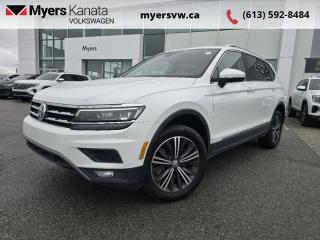 <b>Sunroof,  Leather Seats,  Navigation,  Premium Audio,  Power Liftgate!</b><br> <br>  Compare at $29868 - Our Price is just $28998! <br> <br>   This 2020 Tiguan splits the difference between a compact crossover and full size SUV, allowing for plenty of room and comfort while maintaining a manageable footprint and elegant style. This  2020 Volkswagen Tiguan is fresh on our lot in Kanata. <br> <br>The weekend warrior! As one of the most minimalist styled crossover SUVs, the Tiguan is the winner of elegance in its competition. Crisp lines, a luxurious ride quality and the largest interior within its class give this Tiguan the high marks as the leader of the crossover SUV segment.This  SUV has 79,675 kms. Its  pure white in colour  . It has an automatic transmission and is powered by a  184HP 2.0L 4 Cylinder Engine.  It may have some remaining factory warranty, please check with dealer for details. <br> <br> Our Tiguans trim level is Highline. This range topping Tiguan Highline comes fully loaded with unique alloy wheels, a premium Fender audio system, panoramic sunroof, satellite navigation, a heated leather steering wheel and heated leather seats, forward collision warning, and autonomous emergency braking. It also includes blind spot detection, chrome exterior trim, an 8 inch touchscreen display, App-Connect smartphone integration Apple CarPlay, Android Auto and streaming audio, remote keyless entry, a rear view camera and much more. This vehicle has been upgraded with the following features: Sunroof,  Leather Seats,  Navigation,  Premium Audio,  Power Liftgate,  Heated Steering Wheel,  Heated Seats. <br> <br>To apply right now for financing use this link : <a href=https://www.myersvw.ca/en/form/new/financing-request-step-1/44 target=_blank>https://www.myersvw.ca/en/form/new/financing-request-step-1/44</a><br><br> <br/><br>Backed by Myers Exclusive NO Charge Engine/Transmission for life program lends itself for your peace of mind and you can buy with confidence. Call one of our experienced Sales Representatives today and book your very own test drive! Why buy from us? Move with the Myers Automotive Group since 1942! We take all trade-ins - Appraisers on site - Full safety inspection including e-testing and professional detailing prior delivery! Every vehicle comes with a free Car Proof History report.<br><br>*LIFETIME ENGINE TRANSMISSION WARRANTY NOT AVAILABLE ON VEHICLES MARKED AS-IS, VEHICLES WITH KMS EXCEEDING 140,000KM, VEHICLES 8 YEARS & OLDER, OR HIGHLINE BRAND VEHICLES (eg.BMW, INFINITI, CADILLAC, LEXUS...). FINANCING OPTIONS NOT AVAILABLE ON VEHICLES MARKED AS-IS OR AS-TRADED.<br> Come by and check out our fleet of 40+ used cars and trucks and 90+ new cars and trucks for sale in Kanata.  o~o