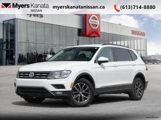 <b>Navigation,  Power Liftgate,  Heated Seats,  Alloy Wheels,  Apple CarPlay!</b><br> <br>  Compare at $29251 - KANATA NISSAN PRICE is just $27595! <br> <br>   For a compact crossover SUV, this Volkswagen Tiguan offers a very comfortable and roomy interior, crafted with high quality standards and excellent materials. This  2021 Volkswagen Tiguan is for sale today in Kanata. This  SUV has 63,128 kms. Its  white in colour  . It has an automatic transmission and is powered by a  184HP 2.0L 4 Cylinder Engine. <br> <br> Our Tiguans trim level is Comfortline 4MOTION. This compact and fully capable Volkswagen Tiguan is loaded with forward collision warning and autonomous emergency braking, unique alloy wheels, blind spot detection, heated front comfort seats, chrome exterior trim, a 6 speaker audio system with a 8 inch touchscreen display, App-Connect smartphone integration with satellite navigation, Apple CarPlay, Android Auto and streaming audio, remote keyless entry, cruise control, a rear view camera and much more.  This vehicle has been upgraded with the following features: Navigation,  Power Liftgate,  Heated Seats,  Alloy Wheels,  Apple Carplay,  Android Auto,  Streaming Audio. <br> <br/><br> Payments from <b>$443.84</b> monthly with $0 down for 84 months @ 8.99% APR O.A.C. ( Plus applicable taxes -  and licensing    ).  See dealer for details. <br> <br>*LIFETIME ENGINE TRANSMISSION WARRANTY NOT AVAILABLE ON VEHICLES WITH KMS EXCEEDING 140,000KM, VEHICLES 8 YEARS & OLDER, OR HIGHLINE BRAND VEHICLE(eg. BMW, INFINITI. CADILLAC, LEXUS...)<br> Come by and check out our fleet of 50+ used cars and trucks and 90+ new cars and trucks for sale in Kanata.  o~o
