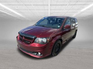 The 2018 Dodge Grand Caravan GT is a minivan known for its spacious interior, family-friendly features, and versatility. Heres an overview of this vehicle:Engine: The 2018 Grand Caravan GT is powered by a 3.6-liter V6 engine, producing around 283 horsepower and 260 lb-ft of torque. This engine is paired with a six-speed automatic transmission, providing smooth acceleration and sufficient power for daily driving and highway cruising.Seating and Interior: The Grand Caravan GT offers seating for up to seven passengers across three rows. The interior is designed with families in mind, featuring comfortable leather-trimmed seats, a power-adjustable drivers seat, and plenty of storage compartments. The Stow n Go seating system allows the second and third-row seats to fold flat into the floor, providing flexible cargo and seating configurations.Features: The GT trim of the Grand Caravan typically comes well-equipped with features such as a rearview camera, tri-zone automatic climate control, remote engine start, a power liftgate, heated front and second-row seats, a touchscreen infotainment system with Bluetooth connectivity, satellite radio, and a premium audio system.Safety: While not the most modern in terms of safety technology compared to newer minivans, the 2018 Grand Caravan GT does come with essential safety features including stability control, traction control, antilock brakes, and a comprehensive suite of airbags. Some models may also include rear parking sensors and a rearview camera.Driving Experience: The Grand Caravan GT provides a smooth and comfortable ride, ideal for long trips and daily errands. The V6 engine delivers sufficient power, and the minivans suspension is tuned for a balance of comfort and handling.Trim Levels: In addition to the GT trim, the 2018 Grand Caravan was available in other trim levels such as SE, SE Plus, and SXT, each offering varying levels of features and options.Overall Impression: The 2018 Dodge Grand Caravan GT is a practical choice for families seeking a reliable and affordable minivan with a range of convenience features. While it lacks some of the advanced safety and tech features found in newer minivans, it compensates with a spacious interior and proven reliability.