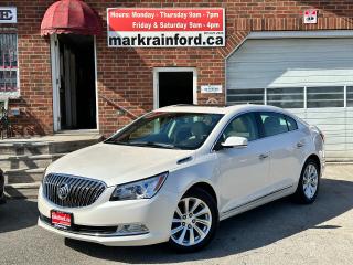 <p>Super-Clean Local, GREAT-KM Buick LaCrosse from Millbrook, ON! This Leather FWD model is LOADED with amazing options inside and out, and looks stunning in its Pearl White Paint and factory alloy wheels! The exterior features keyless entry with remote start and proximity keys, automatic headlights, foglights, a large factory power sunroof, integrated mirror turn signals, sporty dual exhaust, chromed trim accents, a strong and smooth 3.6L V6 engine and automatic transmission! The interior is exceptionally clean and very comfortable with heated power-adjustable leather front seats with driver lumbar control and memory seating, power door locks, mirrors and windows, a leather-wrapped steering wheel with audio and cruise controls, push-button start, electronic and analogue centre gauge cluster, a large central touch screen AM/FM/XM Satellite Radio with BOSE Premium Audio system, Bluetooth, Factory Navigation, Backup Camer and CD player, Dual-Zone A/C climate control with front and rear window defrost settings, universal garage door opener, USB/AUX/12V accessory ports and more!</p><p> </p><p>Carfax Claims Free, Good KM, Stunning Sedan! </p><p> </p><p>Call (905) 623-2906</p><p> </p><p>Text Ryan: (905) 429-9680 or Email: ryan@markrainford.ca</p><p> </p><p>Text Mark: (905) 431-0966 or Email: mark@markrainford.ca</p>
