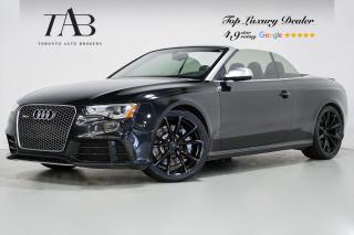 This Powerful 2014 Audi RS 5 4.2 is a local Ontario vehicle with a clean Carfax report. It is a high-performance luxury car known for its exhilarating driving experience and stylish design. 

Key Features Includes:

- Convertible
- V8
- Quattro
- Navigation
- Parking Sensors
- Backup Camera
- Carbon Fiber Interior
- DVD
- Cruise Control
- Blind Spot Assist
- Parking Aid
- 20" Alloy Wheels 

NOW OFFERING 3 MONTH DEFERRED FINANCING PAYMENTS ON APPROVED CREDIT. 

Looking for a top-rated pre-owned luxury car dealership in the GTA? Look no further than Toronto Auto Brokers (TAB)! Were proud to have won multiple awards, including the 2023 GTA Top Choice Luxury Pre Owned Dealership Award, 2023 CarGurus Top Rated Dealer, 2024 CBRB Dealer Award, the Canadian Choice Award 2024,the 2024 BNS Award, the 2023 Three Best Rated Dealer Award, and many more!

With 30 years of experience serving the Greater Toronto Area, TAB is a respected and trusted name in the pre-owned luxury car industry. Our 30,000 sq.Ft indoor showroom is home to a wide range of luxury vehicles from top brands like BMW, Mercedes-Benz, Audi, Porsche, Land Rover, Jaguar, Aston Martin, Bentley, Maserati, and more. And we dont just serve the GTA, were proud to offer our services to all cities in Canada, including Vancouver, Montreal, Calgary, Edmonton, Winnipeg, Saskatchewan, Halifax, and more.

At TAB, were committed to providing a no-pressure environment and honest work ethics. As a family-owned and operated business, we treat every customer like family and ensure that every interaction is a positive one. Come experience the TAB Lifestyle at its truest form, luxury car buying has never been more enjoyable and exciting!

We offer a variety of services to make your purchase experience as easy and stress-free as possible. From competitive and simple financing and leasing options to extended warranties, aftermarket services, and full history reports on every vehicle, we have everything you need to make an informed decision. We welcome every trade, even if youre just looking to sell your car without buying, and when it comes to financing or leasing, we offer same day approvals, with access to over 50 lenders, including all of the banks in Canada. Feel free to check out your own Equifax credit score without affecting your credit score, simply click on the Equifax tab above and see if you qualify.

So if youre looking for a luxury pre-owned car dealership in Toronto, look no further than TAB! We proudly serve the GTA, including Toronto, Etobicoke, Woodbridge, North York, York Region, Vaughan, Thornhill, Richmond Hill, Mississauga, Scarborough, Markham, Oshawa, Peteborough, Hamilton, Newmarket, Orangeville, Aurora, Brantford, Barrie, Kitchener, Niagara Falls, Oakville, Cambridge, Kitchener, Waterloo, Guelph, London, Windsor, Orillia, Pickering, Ajax, Whitby, Durham, Cobourg, Belleville, Kingston, Ottawa, Montreal, Vancouver, Winnipeg, Calgary, Edmonton, Regina, Halifax, and more.

Call us today or visit our website to learn more about our inventory and services. And remember, all prices exclude applicable taxes and licensing, and vehicles can be certified at an additional cost of $699.