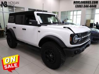 <b>Lux Package,  Leather Seats,  Towing Package,  Adaptive Cruise,  Wireless Charging!</b><br> <br> <br> <br>Check out our great inventory of new vehicles at Novlan Brothers!<br> <br>  With cool retro-styling, innovative features and impressive off-road capability, this legendary 2023 Ford Bronco has very little to prove. <br> <br>With a nostalgia-inducing design along with remarkable on-road driving manners with supreme off-road capability, this 2023 Ford Bronco is indeed a jack of all trades, and masters every one of them. Durable build materials and functional engineering coupled with modern day infotainment and driver assistive features ensure that this iconic vehicle takes on whatever you can throw at it. Want an SUV that can genuinely do it all and look good while at it? Look no further than this 2023 Ford Bronco!<br> <br> This oxford white SUV  has a 10 speed automatic transmission and is powered by a  315HP 2.7L V6 Cylinder Engine.<br> <br> Our Broncos trim level is Wildtrak. This Bronco Wildtrak is a great companion for your off-the-grid adventures, thanks to an amazing assortment of standard features such as front and rear locking differentials, skid plates for undercarriage protection, off-road suspension with FOX racing shock absorbers, aluminum wheels with beadlock capability, and front fog lamps. This rugged off-roader also treats you to amazing comfort and connectivity features that include heated front seats, remote engine start, dual-zone climate control, front and rear cupholders, and an upgraded infotainment system with Apple CarPlay, Android Auto, SiriusXM and inbuilt navigation, to get you back home from your off-road adventures. Road safety is assured thanks to a suite of systems including blind spot detection, pre-collision assist with pedestrian detection and cross-traffic alert, lane keeping assist with lane departure warning, rear parking sensors, and driver monitoring alert. Additional features include proximity keyless entry with push button start, trail control, trail turn assist, and so much more. This vehicle has been upgraded with the following features: Lux Package,  Leather Seats,  Towing Package,  Adaptive Cruise,  Wireless Charging,  Heated Steering,  Heated Seats. <br><br> View the original window sticker for this vehicle with this url <b><a href=http://www.windowsticker.forddirect.com/windowsticker.pdf?vin=1FMEE5DPXPLB66171 target=_blank>http://www.windowsticker.forddirect.com/windowsticker.pdf?vin=1FMEE5DPXPLB66171</a></b>.<br> <br>To apply right now for financing use this link : <a href=http://novlanbros.com/credit/ target=_blank>http://novlanbros.com/credit/</a><br><br> <br/> Weve discounted this vehicle $5800. Total  cash rebate of $4500 is reflected in the price. Credit includes $1,500 Delivery Allowance and $3,000 Non-Stackable Cash Purchase Assistance. Credit is available in lieu of subvented financing rates.  Incentives expire 2024-05-31.  See dealer for details. <br> <br><br> Come by and check out our fleet of 30+ used cars and trucks and 40+ new cars and trucks for sale in Paradise Hill.  o~o