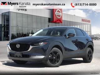 <b>Low Mileage, Navigation,  Head Up Display,  Leather Seats,  Sunroof,  Heated Seats!</b><br> <br>  Compare at $34445 - KANATA NISSAN PRICE is just $32495! <br> <br>   The low platform of this CX-30 makes loading easy, and the generous cargo area leaves you and your passengers with ample space for all of your belongings. This  2021 Mazda CX-30 is fresh on our lot in Kanata. This low mileage  SUV has just 38,250 kms. Its  nice in colour  . It has an automatic transmission and is powered by a  227HP 2.5L 4 Cylinder Engine. <br> <br> Our CX-30s trim level is GT. Enjoy the best that life has to offer in this CX-30 GT with a leather trimmed interior, power sunroof and a premium Bose audio system with 12 speakers. Additional features include a crisp 8.8 inch colour touchscreen display with MAZDA CONNECT and navigation, Apple CarPlay and Android Auto, high gloss exterior trim, LED signature headlights with adaptive high beam assist, fog lights, head-up display and stylish aluminum wheels. You will also get advanced keyless entry with push button start, heated front seats, a heated leather wrapped steering wheel and power driver seat, advanced blind spot monitoring, rear cross traffic alert, rear parking sensors, head up display plus much more! This vehicle has been upgraded with the following features: Navigation,  Head Up Display,  Leather Seats,  Sunroof,  Heated Seats,  Heated Steering Wheel,  Blind Spot Monitoring. <br> <br/><br> Payments from <b>$522.65</b> monthly with $0 down for 84 months @ 8.99% APR O.A.C. ( Plus applicable taxes -  and licensing    ).  See dealer for details. <br> <br>*LIFETIME ENGINE TRANSMISSION WARRANTY NOT AVAILABLE ON VEHICLES WITH KMS EXCEEDING 140,000KM, VEHICLES 8 YEARS & OLDER, OR HIGHLINE BRAND VEHICLE(eg. BMW, INFINITI. CADILLAC, LEXUS...)<br> Come by and check out our fleet of 50+ used cars and trucks and 80+ new cars and trucks for sale in Kanata.  o~o