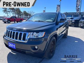 <p>Experience the perfect blend of rugged capability and refined comfort with the 2011 Jeep Grand Cherokee Laredo. As one of the most iconic SUVs in its class, the Grand Cherokee offers exceptional performance both on and off the road, making it the ideal choice for adventure seekers and daily commuters alike.</p>

<p><strong>Performance:</strong></p>

<p>Powered by a robust 3.6-liter V6 engine paired with a dependable 4x4 drivetrain, the Grand Cherokee Laredo delivers impressive performance in any driving condition. Whether youre navigating city streets or tackling rugged terrain, this SUV provides the power and agility you need to conquer every journey with confidence.</p>

<p><strong>Exterior:</strong></p>

<p>Adorned in a sleek Grey exterior, the Grand Cherokee Laredo commands attention with its bold design and unmistakable Jeep styling cues. From its iconic seven-slot grille to its rugged body lines and distinctive wheel arches, every detail reflects Jeeps legendary heritage and commitment to quality craftsmanship.</p>

<p><strong>Interior:</strong></p>

<p>Step inside the spacious cabin of the Grand Cherokee Laredo, and youll find yourself surrounded by comfort and convenience. Thoughtfully designed with premium materials and intuitive features, such as dual-zone automatic climate control and a multifunction steering wheel, this SUV offers a refined driving experience for both driver and passengers.</p>

<p><strong>Technology & Safety:</strong></p>

<p>Equipped with advanced technology and safety features, the Grand Cherokee Laredo ensures a secure and connected ride every time you hit the road. From its intuitive infotainment system with CD player and MP3 decoder to its comprehensive suite of safety systems, including electronic stability control and multiple airbags, this SUV prioritizes your peace of mind and convenience.</p>

<p>In summary, the 2011 Jeep Grand Cherokee Laredo is the epitome of versatility and reliability in the SUV segment. With its powerful performance, rugged yet refined design, and advanced features, this vehicle is perfectly suited for both urban adventures and off-road escapades. Dont miss your chance to experience the thrill of driving a Jeep  visit our dealership today and take the Grand Cherokee Laredo for a test drive!</p>

<p></p>

<p></p>

<p></p>

<form></form>
