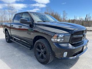 <b>Trade-in, Non-smoker, One Owner, Local, Low Mileage, Air, Rear Air, Tilt, Cruise!</b><br> <br>  Compare at $47632 - Kia of Timmins is just $45800! <br> <br>   This 2022 Ram 1500 Classic is the truck to have, thanks to its incredible powertrain and a well-appointed interior. This  2022 Ram 1500 Classic is fresh on our lot in Timmins. <br> <br>The reasons why this Ram 1500 Classic stands above its well-respected competition are evident: uncompromising capability, proven commitment to safety and security, and state-of-the-art technology. From its muscular exterior to the well-trimmed interior, this 2022 Ram 1500 Classic is more than just a workhorse. Get the job done in comfort and style while getting a great value with this amazing full size truck. This low mileage  Crew Cab 4X4 pickup  has just 22,450 kms. Its  black in colour  . It has a 8 speed automatic transmission and is powered by a  395HP 5.7L 8 Cylinder Engine. <br> <br> Our 1500 Classics trim level is Express. Upgrading to this rugged 1500 Classic Express is a great choice as it comes loaded with stylish aluminum wheels, body colored bumpers, front fog lights, heavy-duty shock absorbers, electronic stability control and trailer sway control. Additional features include ParkView rear back-up camera, cruise control, air conditioning, an infotainment hub with SiriusXM, radio 3.0 and a USB port, automatic headlights, power windows, power doors, and more. This vehicle has been upgraded with the following features: Air, Rear Air, Tilt, Cruise, Power Windows, Power Locks, Power Mirrors. <br> To view the original window sticker for this vehicle view this <a href=http://www.chrysler.com/hostd/windowsticker/getWindowStickerPdf.do?vin=3C6RR7KT9NG396162 target=_blank>http://www.chrysler.com/hostd/windowsticker/getWindowStickerPdf.do?vin=3C6RR7KT9NG396162</a>. <br/><br> <br>To apply right now for financing use this link : <a href=https://www.kiaoftimmins.com/timmins-ontario-car-loan-application target=_blank>https://www.kiaoftimmins.com/timmins-ontario-car-loan-application</a><br><br> <br/><br> Buy this vehicle now for the lowest bi-weekly payment of <b>$339.50</b> with $0 down for 84 months @ 8.99% APR O.A.C. ( Plus applicable taxes -  Plus applicable fees   / Total Obligation of $61789  ).  See dealer for details. <br> <br>As a local, family owned and operated dealership we look to be your number one place to buy your new vehicle! Kia of Timmins has been serving a large community across northern Ontario since 2001 and focuses highly on customer satisfaction. Our #1 priority is to make you feel at home as soon as you step foot in our dealership. Family owned and operated, our business is in Timmins, Ontario the city with the heart of gold. Also positioned near many towns in which we service such as: South Porcupine, Porcupine, Gogama, Foleyet, Chapleau, Wawa, Hearst, Mattice, Kapuskasing, Moonbeam, Fauquier, Smooth Rock Falls, Moosonee, Moose Factory, Fort Albany, Kashechewan, Abitibi Canyon, Cochrane, Iroquois falls, Matheson, Ramore, Kenogami, Kirkland Lake, Englehart, Elk Lake, Earlton, New Liskeard, Temiskaming Shores and many more.We have a fresh selection of new & used vehicles for sale for you to choose from. If we dont have what you need, we can find it! All makes and models are within our reach including: Dodge, Chrysler, Jeep, Ram, Chevrolet, GMC, Ford, Honda, Toyota, Hyundai, Mitsubishi, Nissan, Lincoln, Mazda, Subaru, Volkswagen, Mini-vans, Trucks and SUVs.<br><br>We are located at 1285 Riverside Drive, Timmins, Ontario. Too far way? We deliver anywhere in Ontario and Quebec!<br><br>Come in for a visit, call 1-800-661-6907 to book a test drive or visit <a href=https://www.kiaoftimmins.com>www.kiaoftimmins.com</a> for complete details. All prices are plus HST and Licensing.<br><br>We look forward to helping you with all your automotive needs!<br> o~o
