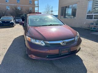 <p>One Owner Civic. Low kms, Clean Carfax showing full service history from Honda Dealer. Rustproofed. Features; keyless entry, power group, cruise control, CD, Bluetooth and much more.</p><p>Why Buy From Us. Since 1991, Our Family commitment to each and every person has been to provide an exceptional level of customer service. From our knowledge in the industry and formed relationships we search for the cleanest, lowest kilometers vehicles while keeping our overhead costs low to save you money. We are part of a large Dealer Network with access to New Car Dealer trade-ins, we attend multiple weekly auctions and have our own trade-ins to provide a comprehensive lineup of all makes & models. After the sale, we welcome you back for any and all of your automotive needs; from regular service, to maintenance, tires & tire storage, detailing, dent removal, windshield chip repair or replacement we have the right tools and skilled workers to get the job done. We invite you to come in for a truly enjoyable car buying experience.</p><p>We offer; Preferred Dealer Bank financing available right here On Approved Credit. A Dealer Guarantee with every Certified vehicle, Free CARFAX Canada Vehicle History Report. We are a proud member of UCDA and maintain A+ Better Bureau Standing. Price plus HST & license.</p>