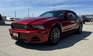 <p style=text-align: center;><strong><span style=font-size: 18pt;>2014 FORD MUSTANG 2DR CONVERTIBLE V6 PREMIUM</span></strong></p><p style=text-align: center;><strong><span style=font-size: 18pt;>3.7L TI-VCT V6 ENGINE</span></strong></p><p style=text-align: center;><span style=font-size: 14pt;>305 HORSEPOWER | 280 LB-FT OF TORQUE</span></p><p style=text-align: center;><span style=font-size: 14pt;>6.7L/100KM HIGHWAY | 10.8L/100KM CITY | 8.8L/100KM COMBINED</span></p><p style=text-align: center;><strong><span style=font-size: 18pt;>6-SPEED SELECTSHIFT® AUTOMATIC TRANSMISSION</span></strong></p><p style=text-align: center;><strong><span style=font-size: 18pt;>18 STERLING GREY METALLIC PAINTED ALUMINUM WHEELS</span></strong></p><p style=text-align: center;> </p><p style=text-align: center;><span style=font-size: 14pt;><strong>MECHANICAL</strong></span></p><p style=text-align: center;><span style=font-size: 14pt;>4-wheel disc Anti-Lock Brake System (ABS), All-speed traction control ,Coil-over strut front suspension, Coil spring 3-link solid-axle rear suspension, Front and rear stabilizer bars, Selectable-effort electric power-assisted steering (Standard, Comfort, Sport), 2.73 gear ratio with limited-slip rear differential</span></p><p style=text-align: center;><strong><span style=font-size: 14pt;>INTERIOR</span></strong></p><p style=text-align: center;><span style=font-size: 14pt;>Front bucket seats, 50/50 rear seats, 12V powerpoints (2), Auxiliary audio input jack, carpeted front floor mats, Centre floor console with armrest and locking storage, Cruise control, 4-gauge instrument cluster with chrome accents, Leather-wrapped steering wheel, Message centre, Premium AM/FM stereo/single-CD audio system, Single-zone manual air conditioning, Steering wheel-mounted cruise control, Interior trunk release, Power door locks, Power windows with one-touch up/down feature, Sun visors with multipurpose storage system and illuminated vanity mirrors, Tilt steering column, 4-way manually adjustable driver’s seat with height adjustment, 2-way manually adjustable front-passenger seat, Cloth-trimmed seats</span></p><p style=text-align: center;><strong><span style=font-size: 14pt;>EXTERIOR</span></strong></p><p style=text-align: center;><span style=font-size: 14pt;>Automatic high-intensity discharge (HID) headlamps, Easy Fuel capless fuel filler, Rear sequential LED turn signal lamps, Rear window defroster, Variable intermittent wipers, Fog lamps, Stainless steel dual exhaust tips, Vinyl convertible top</span></p><p style=text-align: center;><strong><span style=font-size: 14pt;>SAFETY & SECURITY</span></strong></p><p style=text-align: center;><span style=font-size: 14pt;> Personal Safety System with dual-stage front airbags, AdvanceTrac Electronic Stability Control (ESC), Front seatbelt reminder, Front side airbags, Illuminated entry system, LATCH anchors for children, MyKey technology, Remote keyless entry system with integrated key transmitter remotes, Safety belt restraint system, SecuriLock passive Anti-Theft Engine Immobilizer system, SOS Post-Crash Alert System, Tire pressure monitoring system (excludes spare)</span></p><p style=text-align: center;> </p><p style=text-align: center;><strong><span style=font-size: 14pt;>OPTIONAL EQUIPMENT</span></strong></p><p style=text-align: center;><span style=font-size: 14pt;><span style=font-size: 18.6667px;><em><span style=text-decoration: underline;>Equipment Group 202A – V6 Pony Package:</span></em><br />18 polished aluminum wheels, Unique Pony grille, Body-colour sideview mirrors, Lower bodyside tape stripes, Rear decklid spoiler, Carpeted front floor mats with embroidered Pony logo (included in addition to WeatherTec mats)</span></span></p><p style=text-align: center;><span style=font-size: 14pt;><span style=font-size: 18.6667px;><em><span style=text-decoration: underline;>Comfort Package:</span></em><br /></span></span><span style=font-size: 14pt;><span style=font-size: 18.6667px;>6-way power front-passenger seat, Heated front seats, and sideview mirrors with Pony projection lamps</span></span></p><p style=text-align: center;><span style=font-size: 14pt;><span style=font-size: 18.6667px;><em><span style=text-decoration: underline;>Interior Upgrade Package:</span></em><br />4.2 colour LCD display in instrument cluster with MyColor® illumination and Track Apps, Ambient lighting, Auto-dimming rearview mirror, Bright-aluminum instrument panel, Pedal covers, Door-sill scuff plates, Shift knob, Bright-chrome door speaker surrounds, Vinyl door-trim panel inserts, Sport cloth seats, Ford SYNC, SiriusXM Satellite Radio capable, Steering wheel-mounted cruise, audio, and 5-way message centre controls, Universal garage door opener, Shaker™ Audio System with AM/FM stereo/single-CD player with MP3 capability and 6 speakers</span></span></p><p style=text-align: center;> </p><p style=text-align: center;> </p><p style=box-sizing: border-box; margin-bottom: 1rem; margin-top: 0px; color: #212529; font-family: -apple-system, BlinkMacSystemFont, Segoe UI, Roboto, Helvetica Neue, Arial, Noto Sans, Liberation Sans, sans-serif, Apple Color Emoji, Segoe UI Emoji, Segoe UI Symbol, Noto Color Emoji; font-size: 16px; background-color: #ffffff; text-align: center; line-height: 1;><span style=box-sizing: border-box; font-family: arial, helvetica, sans-serif;><span style=box-sizing: border-box; font-weight: bolder;><span style=box-sizing: border-box; font-size: 14pt;>Here at Lanoue/Amfar Sales, Service & Leasing in Tilbury, we take pride in providing the public with a wide variety of High-Quality Pre-owned Vehicles. We recondition and certify our vehicles to a level of excellence that exceeds the Status Quo. We treat our Customers like family and provide the highest level of service from Start to Finish. If you’d like a smooth & stress-free car shopping experience, give one of our Sales Associates a call at 1-844-682-3325 to help you find your next NEW-TO-YOU vehicle!</span></span></span></p><p style=box-sizing: border-box; margin-bottom: 1rem; margin-top: 0px; color: #212529; font-family: -apple-system, BlinkMacSystemFont, Segoe UI, Roboto, Helvetica Neue, Arial, Noto Sans, Liberation Sans, sans-serif, Apple Color Emoji, Segoe UI Emoji, Segoe UI Symbol, Noto Color Emoji; font-size: 16px; background-color: #ffffff; text-align: center; line-height: 1;><span style=box-sizing: border-box; font-family: arial, helvetica, sans-serif;><span style=box-sizing: border-box; font-weight: bolder;><span style=box-sizing: border-box; font-size: 14pt;>Although we try to take great care in being accurate with the information in this listing, from time to time, errors occur. The vehicle is priced as it is physically equipped. Minor variances will not effect pricing. Please verify the vehicle is As Expected when you visit. Thank You!</span></span></span></p>