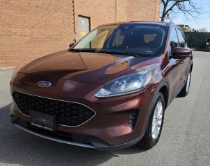 <div>VERY CLEAN 2021 FORD ESCAPE SE AWD. LOADED WITH FEATURES.</div><div><br /></div><div>Credit Cards Accepted</div><div><br /></div><div>Please call for more info and to book a test drive at 289-200-9805. Car-Fax is included in the asking price. Extended Warranties are also available. We offer financing too. Certification: Have your new pre-owned vehicle certified. We offer a full safety inspection including oil change, and professional detailing prior to delivery. Certification package is available for $699. All trade-ins are welcome. Taxes and licensing are extra.***</div>