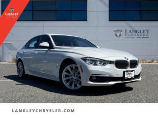 <p><strong><span style=font-family:Arial; font-size:18px;>Experience Sophistication and Comfort with Our 2017 BMW 330i xDrive Sedan: Leather | Locally Driven | Plenty of Options

Undergo the thrill of the open road like never before with this stunning 2017 BMW 330i xDrive..</span></strong></p> <p><span style=font-family:Arial; font-size:18px;>Wrapped in a crisp white exterior with a luxurious black leather interior, this sedan is not just a vehicle; its a statement of style and sophistication.. With a mere 99,503 km on the odometer, this locally driven gem is equipped with a plethora of options to enhance your driving experience.. Luxury on Wheels:
Smooth roads or wild trails,
Leather hugs each curve you sail..</span></p> <p><span style=font-family:Arial; font-size:18px;>Options abound, delight prevails.. Dive into the heart of this BMW, powered by a robust 2.0L 4-cylinder engine paired with an 8-speed automatic transmission, ensuring a ride thats as smooth as it is responsive.. Navigate through any weather with confidence thanks to the intelligent all-wheel-drive system, and let the advanced navigation system guide you to your next adventure..</span></p> <p><span style=font-family:Arial; font-size:18px;>This vehicle comes loaded with features designed to impress: DVD-Audio for an immersive sound experience, traction control for unmatched stability, and a full suite of safety features including ABS brakes and multiple airbags to ensure your peace of mind.. The power moonroof opens up to let you soak in sunny days or starlit nights, while heated mirrors clear away fog and ice, enhancing visibility.. Every detail is crafted to perfection, from the genuine wood inserts on the dashboard to the meticulously designed leather steering wheel..</span></p> <p><span style=font-family:Arial; font-size:18px;>Memory seats remember your perfect driving position, while dual-zone A/C keeps you and your passengers in absolute comfort, regardless of the weather outside.. Why Choose Langley Chrysler?
At Langley Chrysler, we believe in not just loving your car, but also in loving the experience of buying it.. This BMW 330i xDrive isnt just a purchase; its a partnership between you and the road, facilitated by us..</span></p> <p><span style=font-family:Arial; font-size:18px;>With every feature carefully selected to enhance your drives, this sedan ensures every journey is worth remembering.. Dont wait to make this exquisite vehicle your own.. Visit us at Langley Chrysler and let us help you drive away in luxury and confidence..</span></p> <p><span style=font-family:Arial; font-size:18px;>Remember, dont just love your car, love buying it!.</span></p>Documentation Fee $968, Finance Placement $628, Safety & Convenience Warranty $699

<p>*All prices plus applicable taxes, applicable environmental recovery charges, documentation of $599 and full tank of fuel surcharge of $76 if a full tank is chosen. <br />Other protection items available that are not included in the above price:<br />Tire & Rim Protection and Key fob insurance starting from $599<br />Service contracts (extended warranties) for coverage up to 7 years and 200,000 kms starting from $599<br />Custom vehicle accessory packages, mudflaps and deflectors, tire and rim packages, lift kits, exhaust kits and tonneau covers, canopies and much more that can be added to your payment at time of purchase<br />Undercoating, rust modules, and full protection packages starting from $199<br />Financing Fee of $500 when applicable<br />Flexible life, disability and critical illness insurances to protect portions of or the entire length of vehicle loan</p>