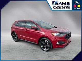 THE PRICE YOU SEE, PLUS GST. GUARANTEED!2.7 LITER ECOBOOST V6, 7 SPEED AUTOMATIC, PANORAMIC ROOF, COLD WEATHER PKG, CO-PILOT 360 ASSIST+ PKG, FORD PASS.  The 2023 Ford Edge ST with the 2.7-liter engine is a high-performance midsize SUV that offers a dynamic driving experience combined with practicality and versatility. The 2.7-liter twin-turbocharged V6 engine produces an impressive 335 horsepower and 380 lb-ft of torque, providing strong acceleration and exhilarating performance. It is paired with a smooth-shifting seven-speed automatic transmission that delivers responsive and precise gear changes. Inside the cabin, the Edge ST offers a comfortable and upscale environment with premium materials and high-quality finishes. The interior is spacious and well-appointed, with plenty of room for passengers and cargo. Features such as leather-trimmed seats, a heated steering wheel, ambient lighting, and a panoramic sunroof enhance the luxury feel of the Edge ST. The 2023 Ford Edge ST also comes equipped with a range of advanced technology and safety features, including a touchscreen infotainment system with Fords SYNC 4 interface, Apple CarPlay and Android Auto compatibility, a premium audio system, adaptive cruise control, lane-keeping assist, blind-spot monitoring, and automatic emergency braking. These features provide connectivity, convenience, and peace of mind for drivers and passengers.Do you want to know more about this vehicle, CALL, CLICK OR COME ON IN!*AMVIC Licensed Dealer; CarProof and Full Mechanical Inspection Included.