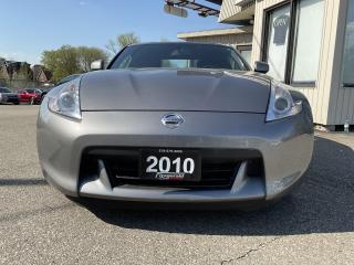 <div><span>Here comes a beautiful Nissan 370Z with only 72,000km! This desirable 2 seater is in like new condition in and out and drives like it shows! Well cared for over the years, must be seen and driven to be appreciated!</span><br></div><br /><div><br></div><br /><div><span>Features: UPGRADED DECK WITH BLUETOOTH, 6-SPEED MANUAL TRANSMISSION, REV MATCH, A/C, AM/FM/CD/AUX/USB, STEERING WHEEL AUDIO CONTROLS, SMART KEY, PUSH START, AND MORE!</span><br><br></div><br /><div><span>Certified!</span><br><span>Carfax Available!</span><br><span>Extended Warranty Available!</span><br><span>ONLY $22,999 PLUS HST & LIC</span></div><br /><div><br></div><br /><div><span>Please call us at 519-579-4995 for any questions you have or drop by FITZGERALD MOTORS located at 380 Courtland Ave East. Kitchener, ON for a test drive! Visit us online at </span><a href=http://www.fitzgeraldmotors.com/ target=_blank><span>www.fitzgeraldmotors.com</span></a><a href=http://www.fitzgeraldmotors.com/></a></div><br /><div><br><span>* Even though we take reasonable precautions to ensure that the information provided is accurate and up to date, we are not responsible for any errors or omissions. Please verify all information directly with Fitzgerald Motors to ensure its exactitude.</span></div>