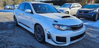 <p class=MsoNormal>2011 Subaru Impreza WRX, 4 cylinder upgraded and modified engine with more than 300 horse power, manual transmission and AWD. Equipped with some upgrades: short shifter, lowered suspension and exhaust system. Power door locks, power window and mirrors. Multi function steering wheel with phone connectivity and cruise control. Heated front seats and tinted windows. 134k km, certified vehicle and comes with safety. Asking price $19,995.</p>