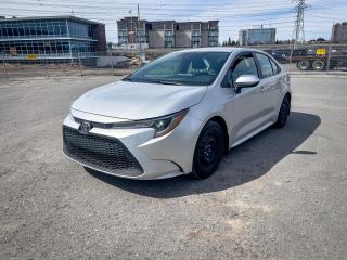 <div><font color=#000000>Discover the perfect blend of style and reliability with the 2020 Toyota Corolla LE. This sleek sedan boasts modern features designed to enhance your driving experience.</font></div><br /><div><font color=#000000>Equipped with two sets of tires youre prepared for any road conditions year-round. Feel the comfort of heated seats and automatic climate control, ensuring a pleasant ride in any weather.</font></div><br /><div><font color=#000000>With low kilometers on the odometer, this Corolla offers you miles of worry-free driving ahead. Safety is paramount with advanced technology like adaptive cruise control and lane departure alert, keeping you secure and aware on the road.</font></div><br /><div><font color=#000000>Maneuver with confidence using the built-in reverse camera, providing a clear view of your surroundings while parking or reversing.</font></div><br /><div><font color=#000000>Upgrade your daily commute with this 2020 Toyota Corolla LE. Visit our dealership today to experience its features firsthand and discover why its the ideal choice for your next vehicle.  Call us now to book an appointment</font></div>