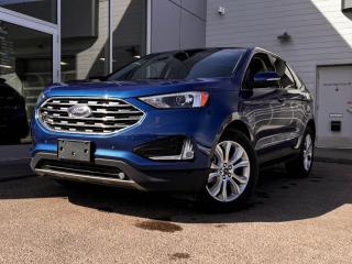 2022 Ford Edge Titanium shown off in Blue! It has black leather seating, driver memory settings, heated front seats, a panoramic sunroof, navigation, blind-spot monitoring, a backup camera, and so much more. Full photos and description coming soon!Please note: this vehicle was previously registered in the province of British Columbia