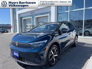 <b>Low Mileage, Tow Package,  Electric Vehicle,  Fast Charging,  Wireless Charging,  Heated Seats!</b><br> <br>    With attention to both form and function, this 2023 VW ID.4 delivers true German-engineered craftsmanship with a stylish, electric twist. This  2023 Volkswagen ID.4 is fresh on our lot in Nepean. <br> <br>Featuring a minimalist but stylish and clean exterior design, this 2023 ID.4 offers a contemporary design with a host of cutting-edge technology systems. The cabin is uncluttered and intuitive, with ergonomic seats, high quality trim pieces and an abundance of space for passenger comfort, and cargo. With impressive electric driving range, rapid charging times, and a suite of intelligent driver assistance packages, this 2023 Volkswagen ID.4 truly is an electric crossover for the masses.This low mileage  SUV has just 590 kms. Its  tourmaline blue metallic in colour  . It has an automatic transmission and is powered by a  Electric engine. <br> <br> Our ID.4s trim level is Pro AWD. This range topping Pro AWD features class II towing equipment with a hitch and a trailer wiring harness, impressive driving range and fast charging capability, along with stain-repellent heated seats, a heated leatherette steering wheel, front and rear cupholders, remote power cargo access, an interactive digital drivers display, and a 12-inch infotainment screen with wireless Apple CarPlay and Android Auto, SiriusXM satellite radio, and inbuilt navigation. Safety features include adaptive cruise control, blind spot detection, lane departure warning, lane keep assist, forward collision warning, autonomous emergency braking, and park distance control with automated parking sensors. Additional features include wireless charging, LED headlights with automatic high beams, and so much more. This vehicle has been upgraded with the following features: Tow Package,  Electric Vehicle,  Fast Charging,  Wireless Charging,  Heated Seats,  Apple Carplay,  Android Auto. <br> <br>To apply right now for financing use this link : <a href=https://www.barrhavenvw.ca/en/form/new/financing-request-step-1/44 target=_blank>https://www.barrhavenvw.ca/en/form/new/financing-request-step-1/44</a><br><br> <br/><br>We are your premier Volkswagen dealership in the region. If youre looking for a new Volkswagen or a car, check out Barrhaven Volkswagens new, pre-owned, and certified pre-owned Volkswagen inventories. We have the complete lineup of new Volkswagen vehicles in stock like the GTI, Golf R, Jetta, Tiguan, Atlas Cross Sport, Volkswagen ID.4 electric vehicle, and Atlas. If you cant find the Volkswagen model youre looking for in the colour that you want, feel free to contact us and well be happy to find it for you. If youre in the market for pre-owned cars, make sure you check out our inventory. If you see a car that you like, contact 844-914-4805 to schedule a test drive.<br> Come by and check out our fleet of 30+ used cars and trucks and 60+ new cars and trucks for sale in Nepean.  o~o