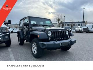 <p><strong><span style=font-family:Arial; font-size:18px;>Plunge yourself into the ultimate driving experience with this unparalleled 2018 Jeep Wrangler JK Sport..</span></strong></p> <p><strong><span style=font-family:Arial; font-size:18px;>Lets face it, theres a legion of SUVs out there, but none quite like this one..</span></strong> <br> With a rugged black exterior that looks as if its been carved from obsidian, and equally striking black interior, its a vehicle that commands respect on every journey.. This Wrangler JK, with its Hard Top and Bluetooth, offers a level of comfort, convenience, and protection not often seen in SUVs.</p> <p><strong><span style=font-family:Arial; font-size:18px;>And with a mileage of just 57938 km, you could say its just about getting warmed up..</span></strong> <br> Dont worry, this isnt just some old clunker thats been sitting in the lot.. Its a spry and robust companion thats ready to hit the road with you.</p> <p><strong><span style=font-family:Arial; font-size:18px;>Under the hood, the 3.6L 6-cylinder engine packs a punch thatll make your heartbeat sync with the rev of the engine..</span></strong> <br> Its coupled with a 5-speed automatic transmission that ensures smooth and effortless drives, whether youre cruising through the city or venturing off-road.. This Wrangler JKs options list reads like a whos who of exciting features: Traction Control for those tricky surfaces, Compass to guide your adventurous spirit, ABS Brakes to enhance your safety, and a CD Player with MP3 decoder to keep your tunes rolling.</p> <p><strong><span style=font-family:Arial; font-size:18px;>It even comes with an Ignition disable and Integrated roll-over protection - because Jeep cares about your safety as much as you do..</span></strong> <br> Now, heres a little fun fact: Did you know that the Jeep Wrangler JK was designed to mimic the WWII Jeeps rugged and capable nature? With its Front fog lights and Front anti-roll bar, youll be ready for just about anything, just like those brave WWII soldiers were!

At Langley Chrysler, we believe that you shouldnt just love your car, but love buying it too.. We make the process as enjoyable and straightforward as possible.</p> <p><strong><span style=font-family:Arial; font-size:18px;>And remember, youre not just getting a vehicle, youre joining a legacy..</span></strong> <br> So, why blend in when you can stand out with this 2018 Jeep Wrangler JK Sport? We cant wait to welcome you to the Langley Chrysler family!</p>Documentation Fee $968, Finance Placement $628, Safety & Convenience Warranty $699

<p>*All prices plus applicable taxes, applicable environmental recovery charges, documentation of $599 and full tank of fuel surcharge of $76 if a full tank is chosen. <br />Other protection items available that are not included in the above price:<br />Tire & Rim Protection and Key fob insurance starting from $599<br />Service contracts (extended warranties) for coverage up to 7 years and 200,000 kms starting from $599<br />Custom vehicle accessory packages, mudflaps and deflectors, tire and rim packages, lift kits, exhaust kits and tonneau covers, canopies and much more that can be added to your payment at time of purchase<br />Undercoating, rust modules, and full protection packages starting from $199<br />Financing Fee of $500 when applicable<br />Flexible life, disability and critical illness insurances to protect portions of or the entire length of vehicle loan</p>