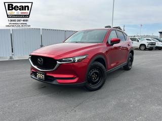 <h2><span style=color:#2ecc71><span style=font-size:18px><strong>2021 Mazda CX-5 Signature</strong></span></span></h2>

<p><span style=font-size:16px>Powered by a 2.5L 4cyl engine.</span></p>

<p><span style=font-size:16px><strong>Comfort & Convenience Features:</strong> includes remote keyless entry/start, heated/ventilated seats, heated steering wheel, power liftgate, 360 view monitor, 19” alloy wheels.</span></p>

<p><span style=font-size:16px><strong>Infotainment Tech & Audio: </strong>8" colour touchscreen display with Mazda Connect,AM/FM/HD radio with bose audio system, Bluetooth connectivity, Android Auto and Apple Carplay.</span></p>

<h2><span style=color:#2ecc71><span style=font-size:18px><strong>Come test drive this SUV today!</strong></span></span></h2>

<h2><span style=color:#2ecc71><span style=font-size:18px><strong>613-257-2432</strong></span></span></h2>