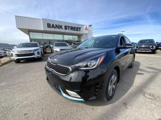 Wow, check this PHEV Niro out! Low mileage and all the goodies! * 1.6L 4 cyl - PHEV motor * CVT * Heated Front Leather Seats * Sunroof * Lane Keep Assist * 8 inch touchscreen * Harman Kardon Stereo System * Heated Rear Seats * Dual Zone Climate Control * Fog Lights * WOW what a great vehicle! We keep the best of the best vehicles here at THE Bank Street Mitsubishi - Make your appointment today! - Why Bank Street Mitsubishi? - Our vehicles are market priced to ensure top value for you. We review the market and work to ensure we are always bringing you the best value possible on our offerings. - Our Sales Team specialize in helping you find your next pre-owned vehicle, by ensuring that vehicle meets your individual needs. We want you to get the right car, the first time! - ALL pre-owned vehicles must pass our rigourous inspection  driven by our factory trained technicians to meet or exceed MTO safety guidelines - Fully reconditioned and detailed to our high standards - Our credit options are extensive. Our buying power with the banks is second to none, and we work hard for every customer. Credit challenges happen to good people. We work with our line of lenders to secure your financing to get you back on the road! - Purchase incentives available on financed purchases only. No incentives on cash purchases. We take this to heart  No One Deals Like Dilawri  and at Bank Street Mitsubishi, were not trying to be the biggest, were just trying to be the best! Let us prove it to you. Get in touch with us today!