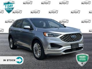 <p><strong>2020 Ford Edge Titanium</strong></p>

<p>4D Sport Utility EcoBoost 2.0L I4 GTDi DOHC Turbocharged VCT 8-Speed Automatic AWD</p>

<ul>
 <li>AWD</li>
 <li>12 Speakers</li>
 <li>3.36 Axle Ratio</li>
 <li>4-Wheel Disc Brakes</li>
 <li>ABS brakes</li>
 <li>Active Transmission Warm-Up</li>
 <li>Air Conditioning</li>
 <li>Alloy wheels</li>
 <li>AM/FM radio: SiriusXM</li>
 <li>Auto High-beam Headlights</li>
 <li>Auto tilt-away steering wheel</li>
 <li>Auto-dimming Rear-View mirror</li>
 <li>Automatic temperature control</li>
 <li>Block heater</li>
 <li>Brake assist</li>
 <li>Bumpers: body-colour</li>
 <li>Compass</li>
 <li>Delay-off headlights</li>
 <li>Driver door bin</li>
 <li>Driver vanity mirror</li>
 <li>Dual front impact airbags</li>
 <li>Dual front side impact airbags</li>
 <li>Electronic Stability Control</li>
 <li>Emergency communication system: SYNC 3 911 Assist</li>
 <li>Four wheel independent suspension</li>
 <li>Front anti-roll bar</li>
 <li>Front Bucket Seats</li>
 <li>Front dual zone A/C</li>
 <li>Front fog lights</li>
 <li>Front Heated Leather-Trimmed Sport Bucket Seats</li>
 <li>Front reading lights</li>
 <li>Fully automatic headlights</li>
 <li>Garage door transmitter</li>
 <li>Heated door mirrors</li>
 <li>Heated front seats</li>
 <li>Illuminated entry</li>
 <li>Knee airbag</li>
 <li>Low tire pressure warning</li>
 <li>Memory seat</li>
 <li>Occupant sensing airbag</li>
 <li>Outside temperature display</li>
 <li>Overhead airbag</li>
 <li>Overhead console</li>
 <li>Panic alarm</li>
 <li>Passenger door bin</li>
 <li>Passenger vanity mirror</li>
 <li>Power door mirrors</li>
 <li>Power driver seat</li>
 <li>Power Liftgate</li>
 <li>Power passenger seat</li>
 <li>Power steering</li>
 <li>Power windows</li>
 <li>Radio: AM/FM Stereo/MP3 Capable</li>
 <li>Rain sensing wipers</li>
 <li>Rear anti-roll bar</li>
 <li>Rear reading lights</li>
 <li>Rear window defroster</li>
 <li>Rear window wiper</li>
 <li>Remote keyless entry</li>
 <li>Roof rack: rails only</li>
 <li>Security system</li>
 <li>Speed control</li>
 <li>Speed-Sensitive Wipers</li>
 <li>Split folding rear seat</li>
 <li>Spoiler</li>
 <li>Steering wheel memory</li>
 <li>Steering wheel mounted audio controls</li>
 <li>SYNC 3 Communications & Entertainment System</li>
 <li>Tachometer</li>
 <li>Telescoping steering wheel</li>
 <li>Tilt steering wheel</li>
 <li>Traction control</li>
 <li>Trip computer</li>
 <li>Turn signal indicator mirrors</li>
 <li>Variably intermittent wipers</li>
 <li>Wheels: 19 Luster Nickel-Painted Aluminum</li>
</ul>

SPECIAL NOTE: This vehicle is reserved for AutoIQs Retail Customers Only. Please, No Dealer Calls 
<br/><br/>
Dont Delay! With over 140 Sales Professionals Promoting this Pre-Owned Vehicle through 11 Dealerships Representing 11 Communities Across Ontario, this Great Value Wont Last Long!
<br/><br/>
AutoIQ proudly offers a 7 Day Money Back Guarantee. Buy with Complete Confidence. You wont be disappointed!
<p> </p>

<h4>VALUE+ CERTIFIED PRE-OWNED VEHICLE</h4>

<p>36-point Provincial Safety Inspection<br />
172-point inspection combined mechanical, aesthetic, functional inspection including a vehicle report card<br />
Warranty: 30 Days or 1500 KMS on mechanical safety-related items and extended plans are available<br />
Complimentary CARFAX Vehicle History Report<br />
2X Provincial safety standard for tire tread depth<br />
2X Provincial safety standard for brake pad thickness<br />
7 Day Money Back Guarantee*<br />
Market Value Report provided<br />
Complimentary 3 months SIRIUS XM satellite radio subscription on equipped vehicles<br />
Complimentary wash and vacuum<br />
Vehicle scanned for open recall notifications from manufacturer</p>

<p>SPECIAL NOTE: This vehicle is reserved for AutoIQs retail customers only. Please, No dealer calls. Errors & omissions excepted.</p>

<p>*As-traded, specialty or high-performance vehicles are excluded from the 7-Day Money Back Guarantee Program (including, but not limited to Ford Shelby, Ford mustang GT, Ford Raptor, Chevrolet Corvette, Camaro 2SS, Camaro ZL1, V-Series Cadillac, Dodge/Jeep SRT, Hyundai N Line, all electric models)</p>

<p>INSGMT</p>
