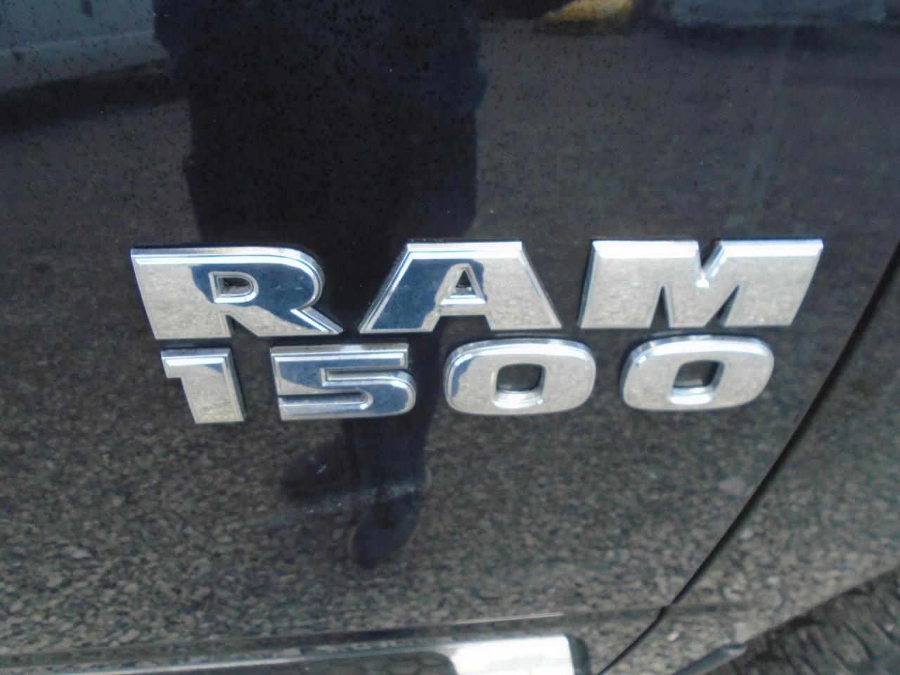 2015 RAM 1500 4WD Quad Cab 140.5  Big Horn - Photo #12